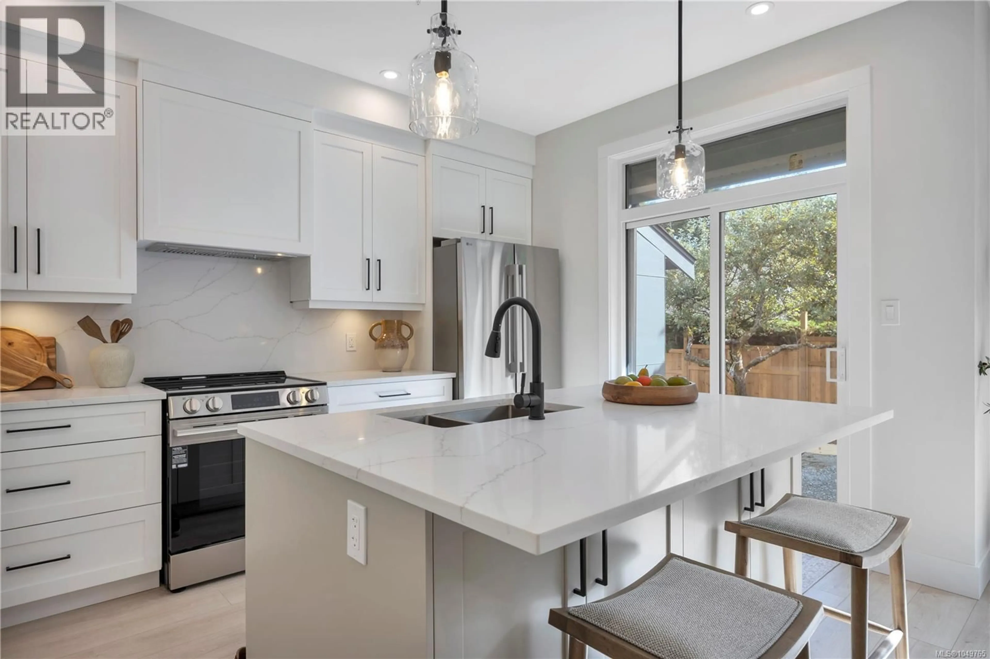 Open concept kitchen, ceramic/tile floor for 103 - 6004 NELSON ROAD, Nanaimo British Columbia V9T5N7