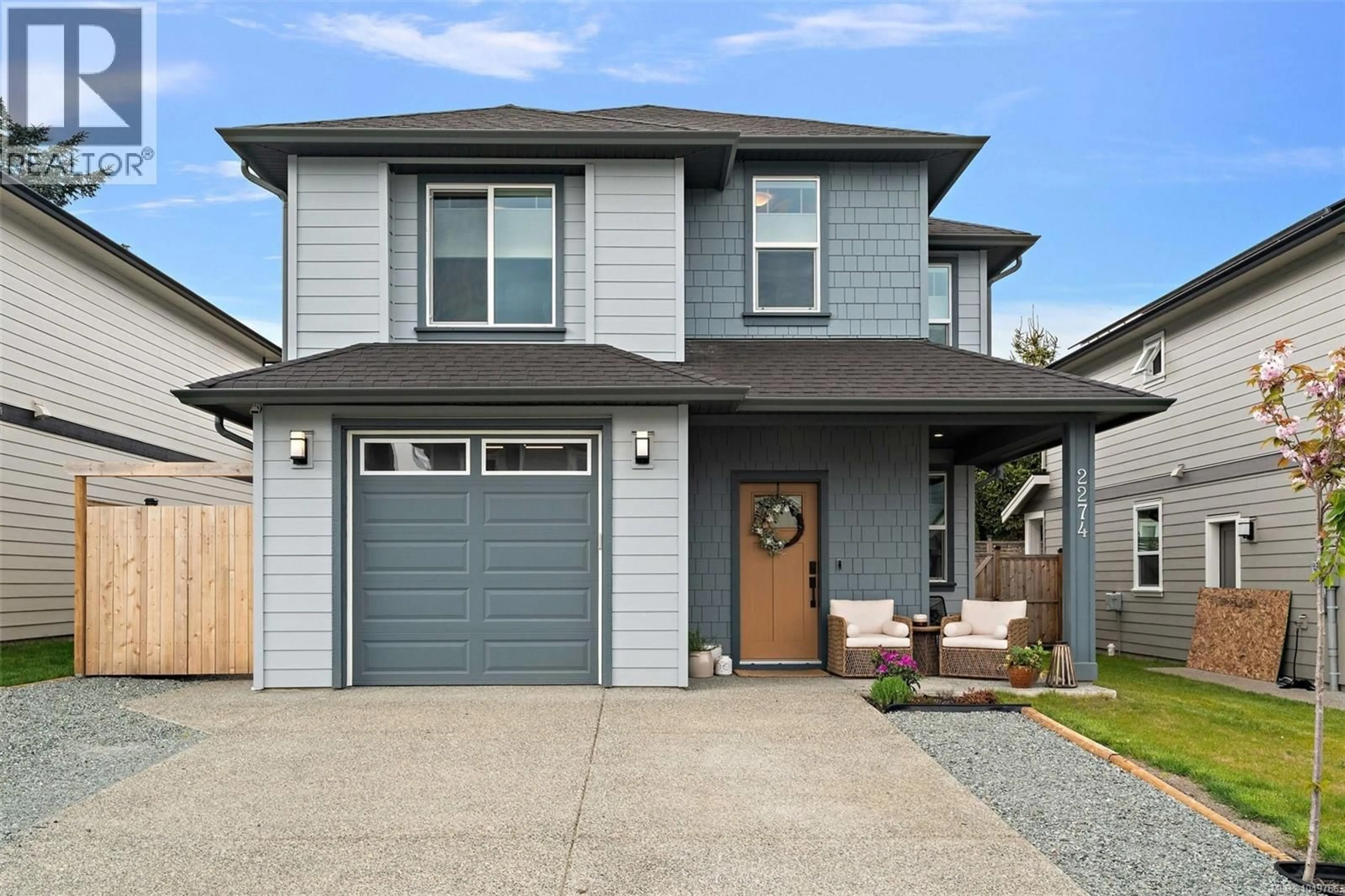 Home with vinyl exterior material, street for 2274 EVELYN LANE, Sooke British Columbia V9Z0W3
