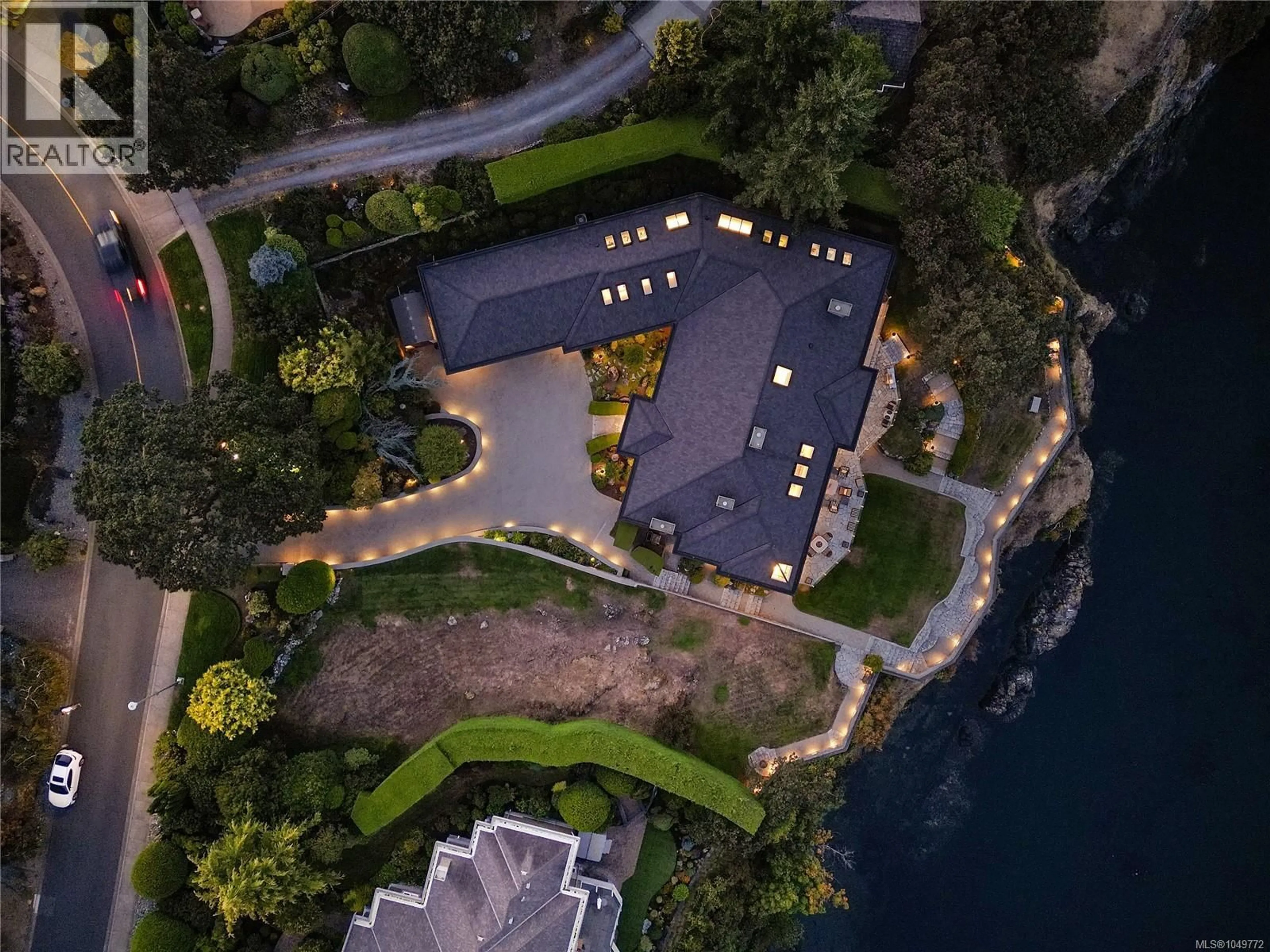 A pic from outside/outdoor area/front of a property/back of a property/a pic from drone, water/lake/river/ocean view for 4532 GORDON POINT DRIVE, Saanich British Columbia V8N6L2