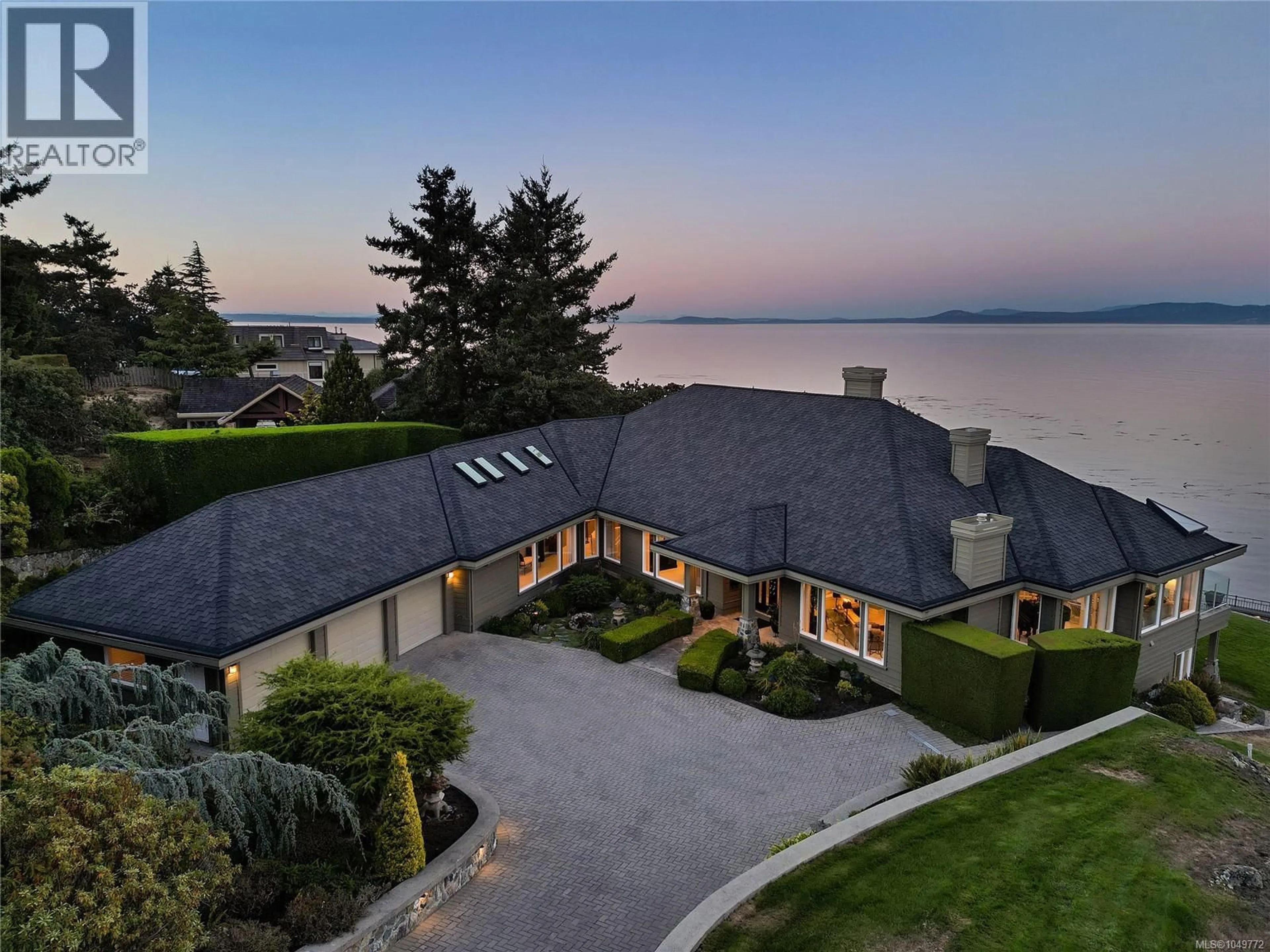 A pic from outside/outdoor area/front of a property/back of a property/a pic from drone, water/lake/river/ocean view for 4532 GORDON POINT DRIVE, Saanich British Columbia V8N6L2