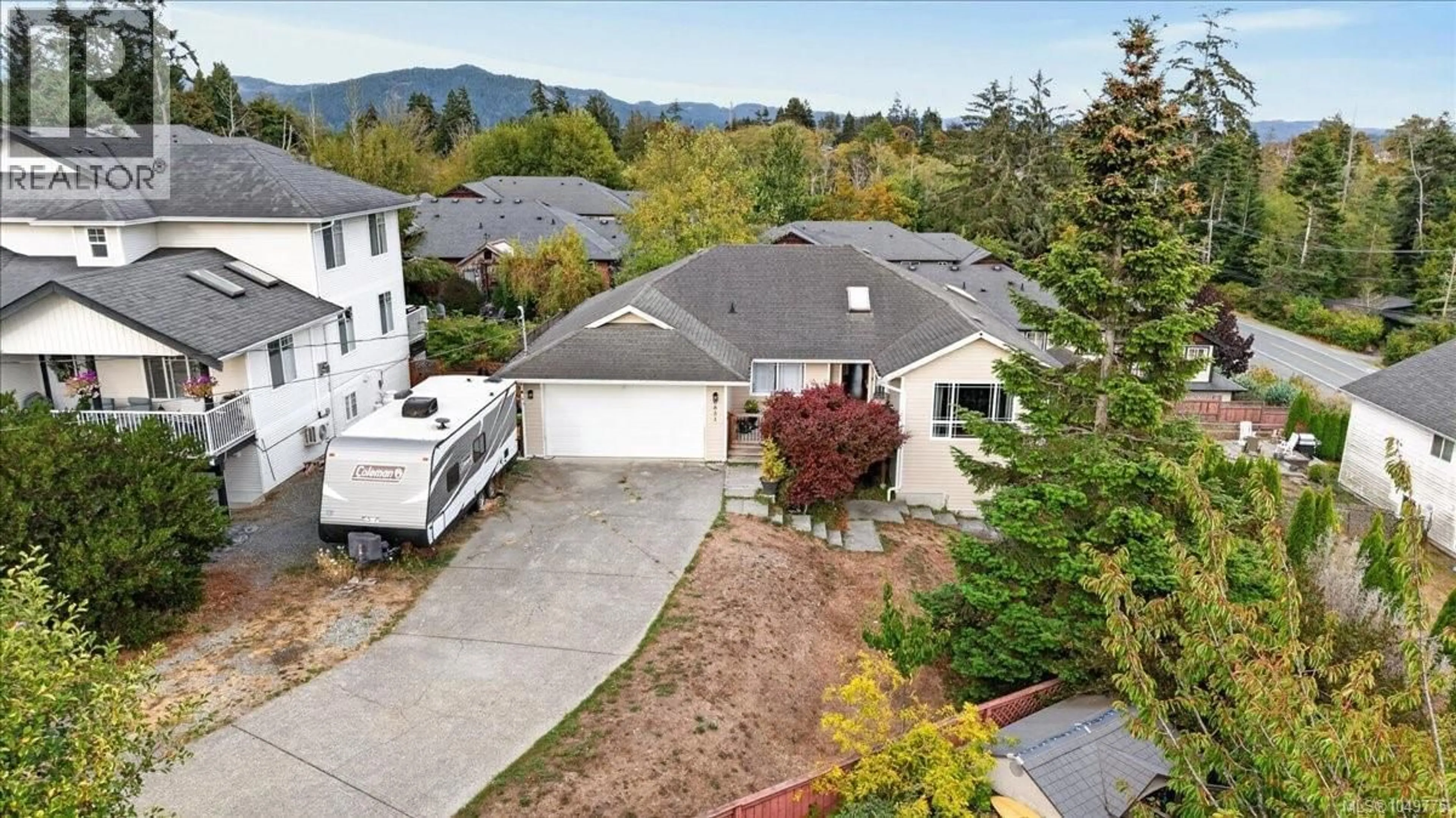 A pic from outside/outdoor area/front of a property/back of a property/a pic from drone, mountain view for 6851 BANNER ROAD, Sooke British Columbia V0S1N0