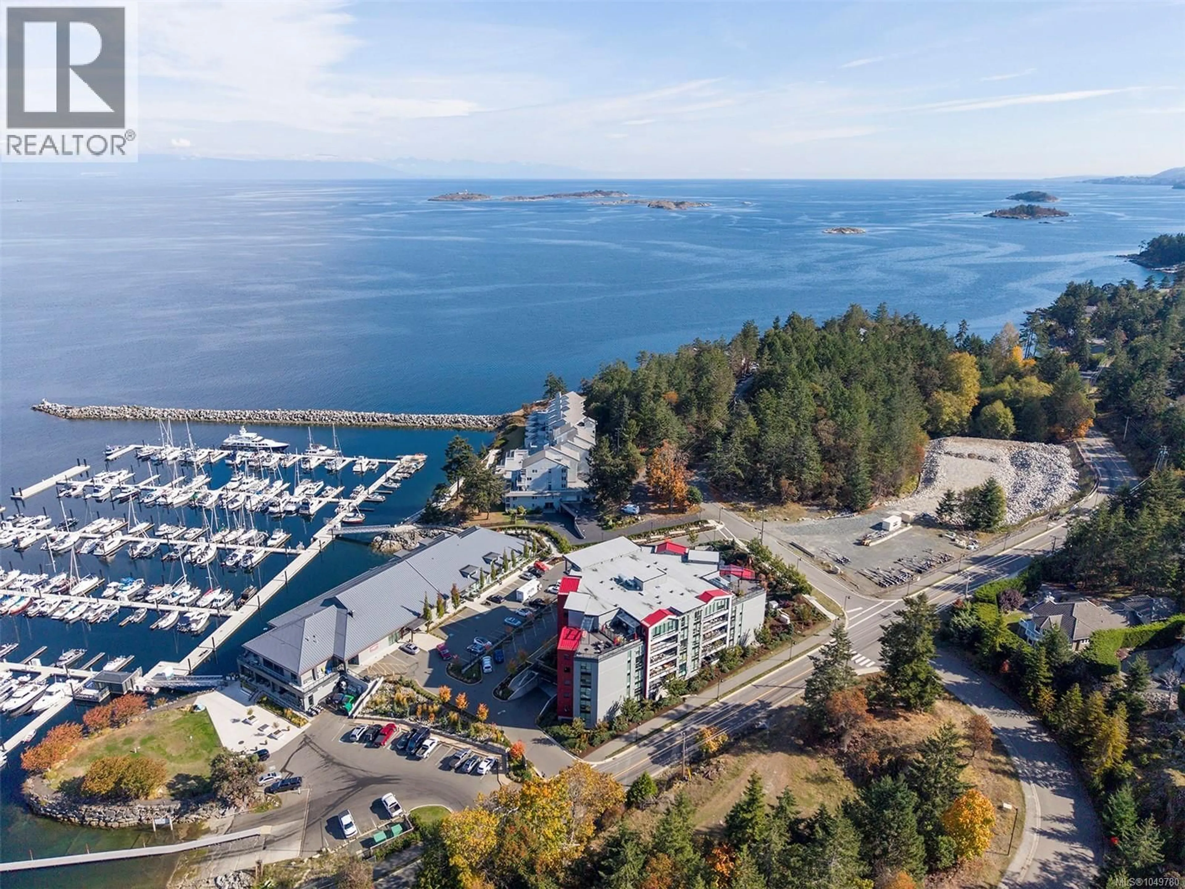 A pic from outside/outdoor area/front of a property/back of a property/a pic from drone, water/lake/river/ocean view for 407 - 3529 DOLPHIN DRIVE, Nanoose Bay British Columbia V9P9J7