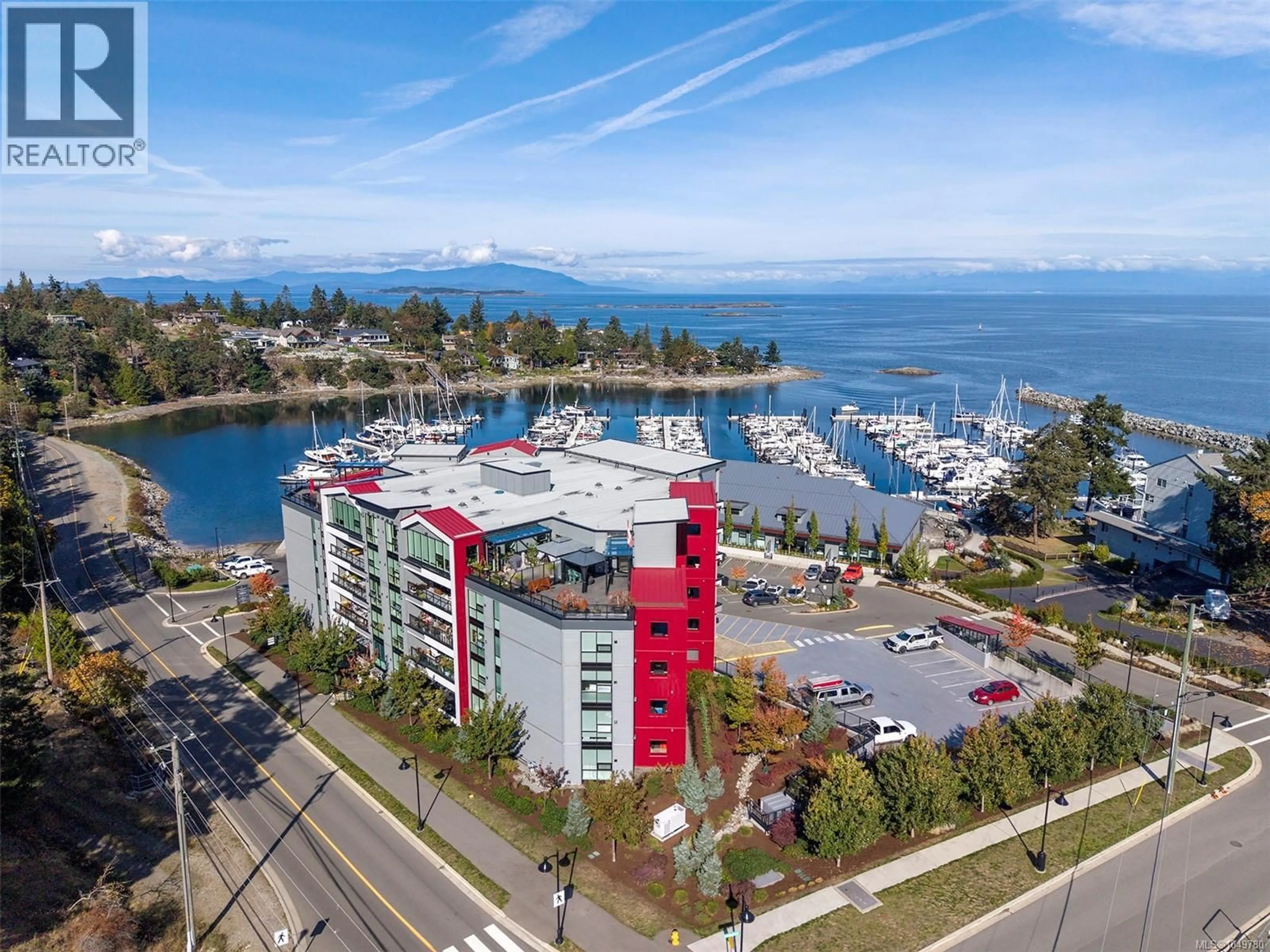 A pic from outside/outdoor area/front of a property/back of a property/a pic from drone, water/lake/river/ocean view for 407 - 3529 DOLPHIN DRIVE, Nanoose Bay British Columbia V9P9J7