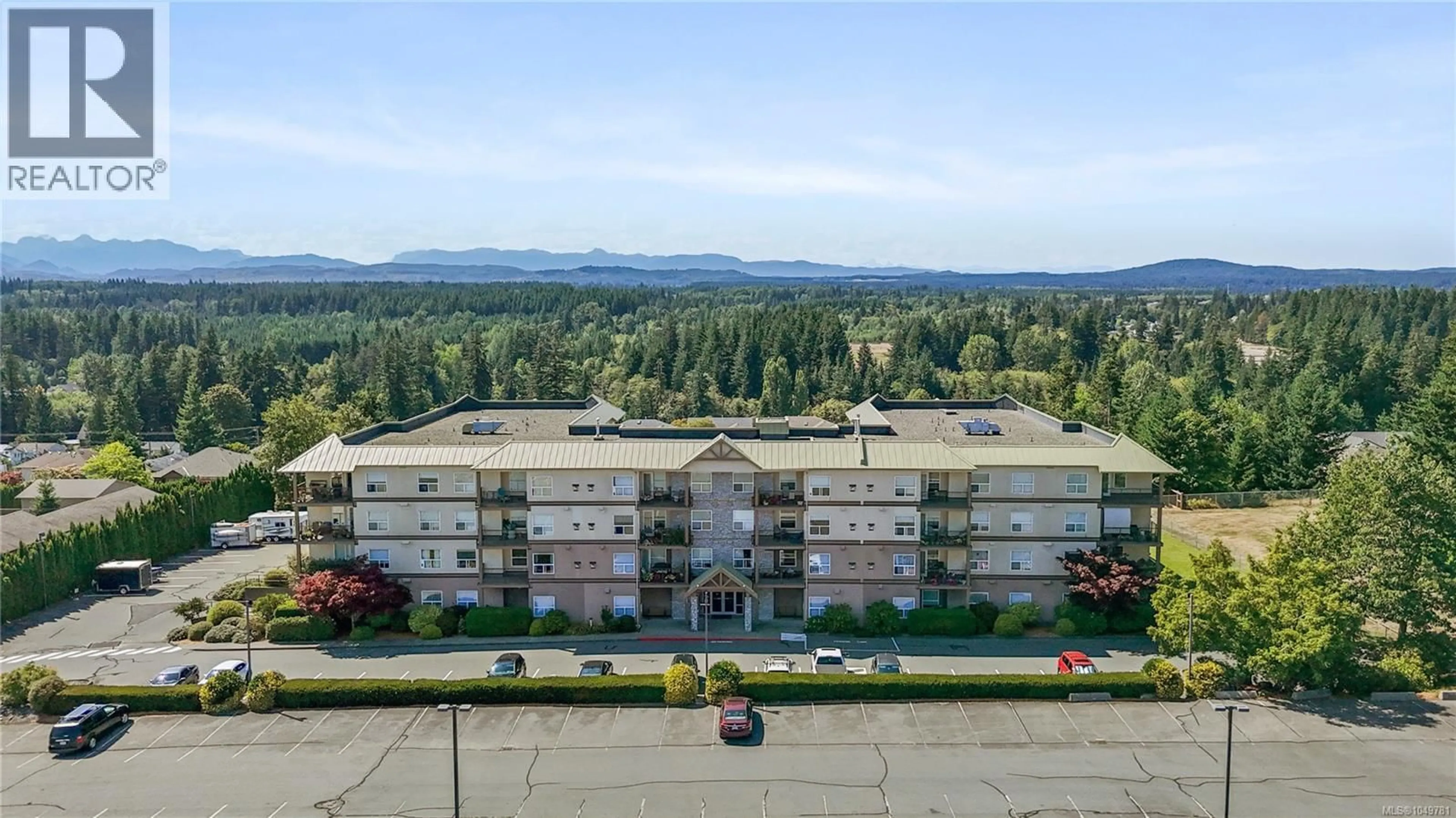 A pic from outside/outdoor area/front of a property/back of a property/a pic from drone, mountain view for 207 - 280 DOGWOOD STREET SOUTH, Campbell River British Columbia V9W6Y7