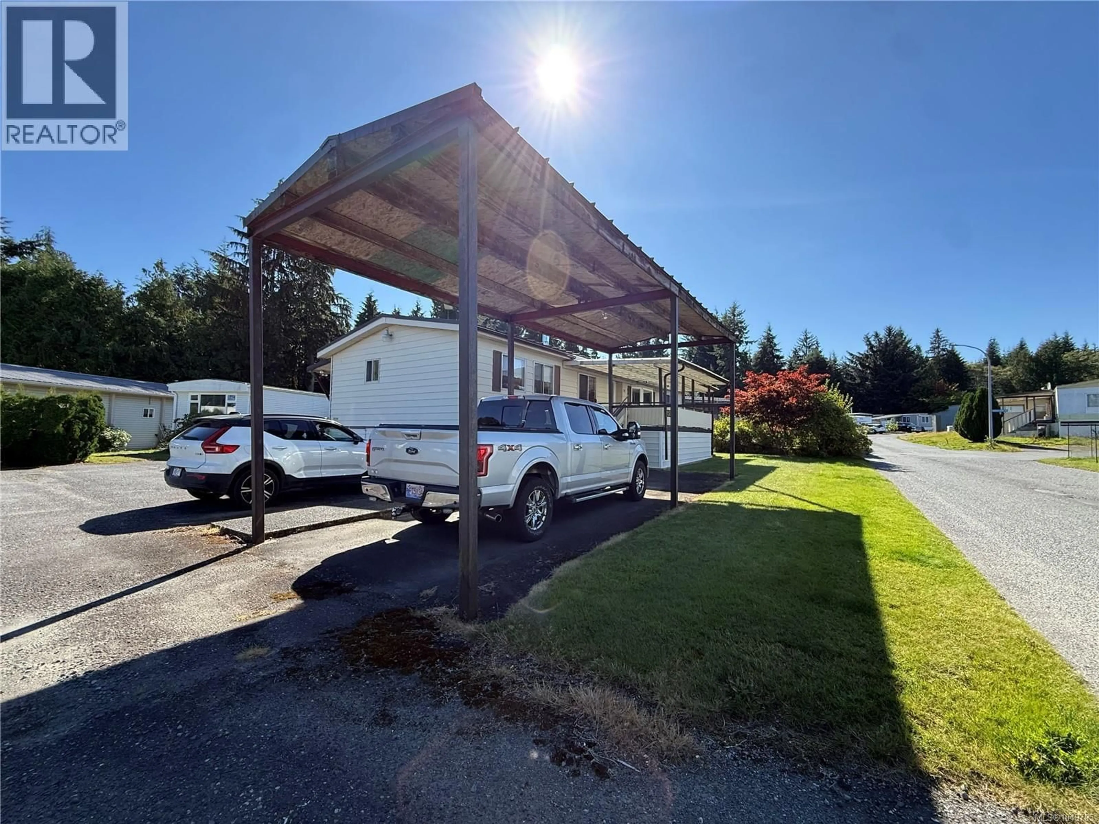 A pic from outside/outdoor area/front of a property/back of a property/a pic from drone, street for 9511 CHANCELLOR HEIGHTS, Port Hardy British Columbia V0N2P0