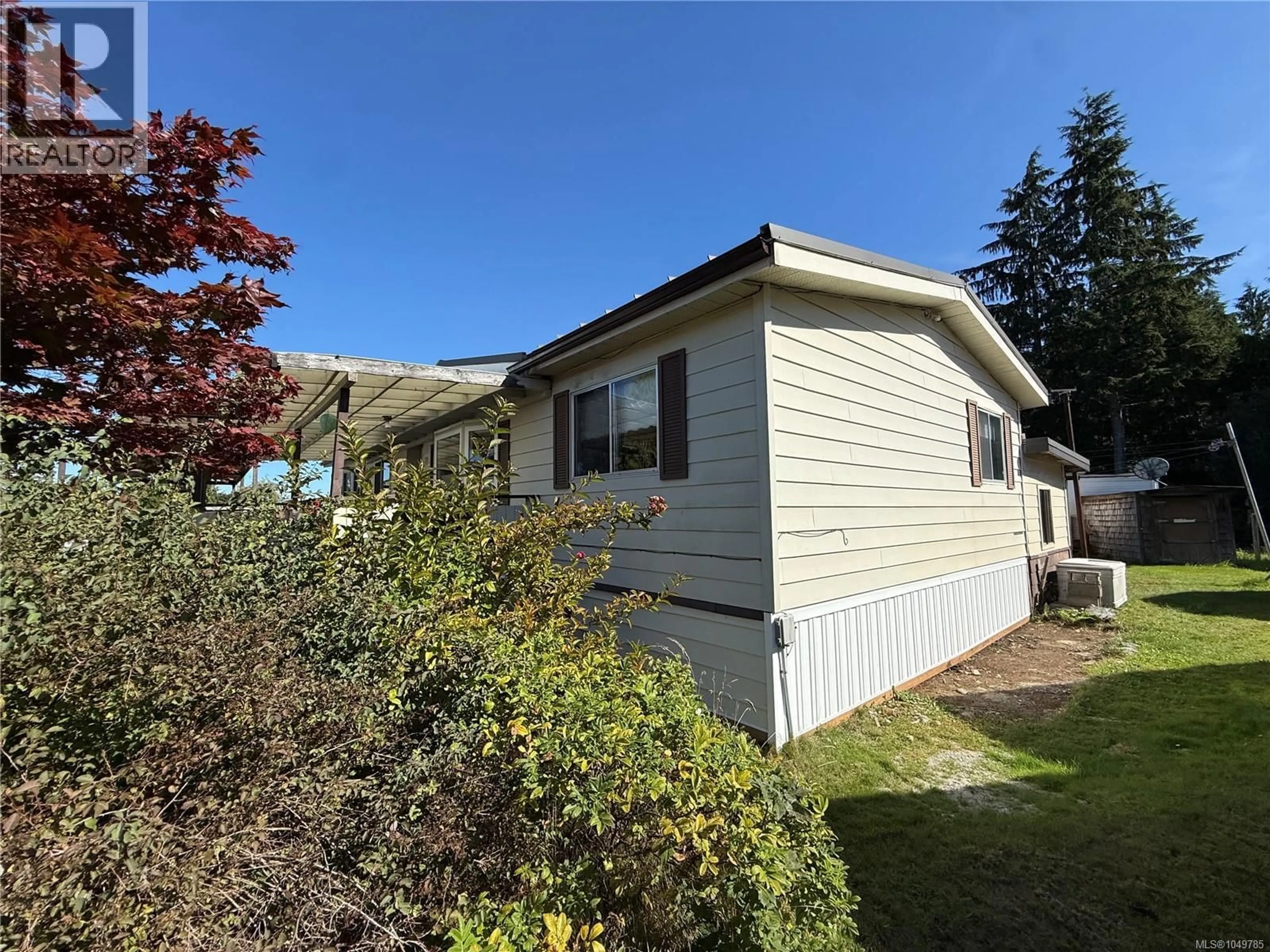 Home with vinyl exterior material, street for 9511 CHANCELLOR HEIGHTS, Port Hardy British Columbia V0N2P0