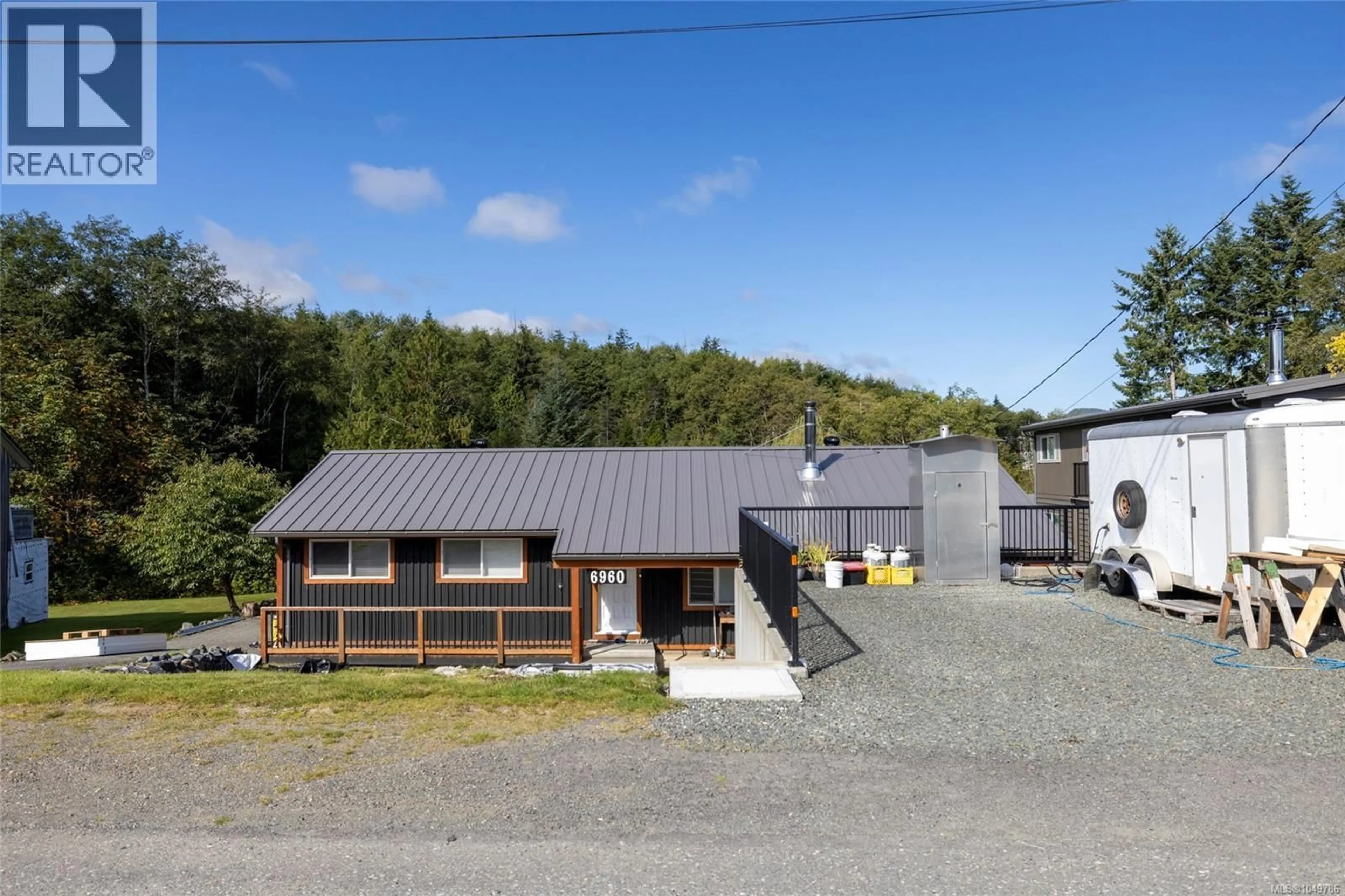 A pic from outside/outdoor area/front of a property/back of a property/a pic from drone, building for 6960 QUATSE CRESCENT, Port Hardy British Columbia V0N2P0