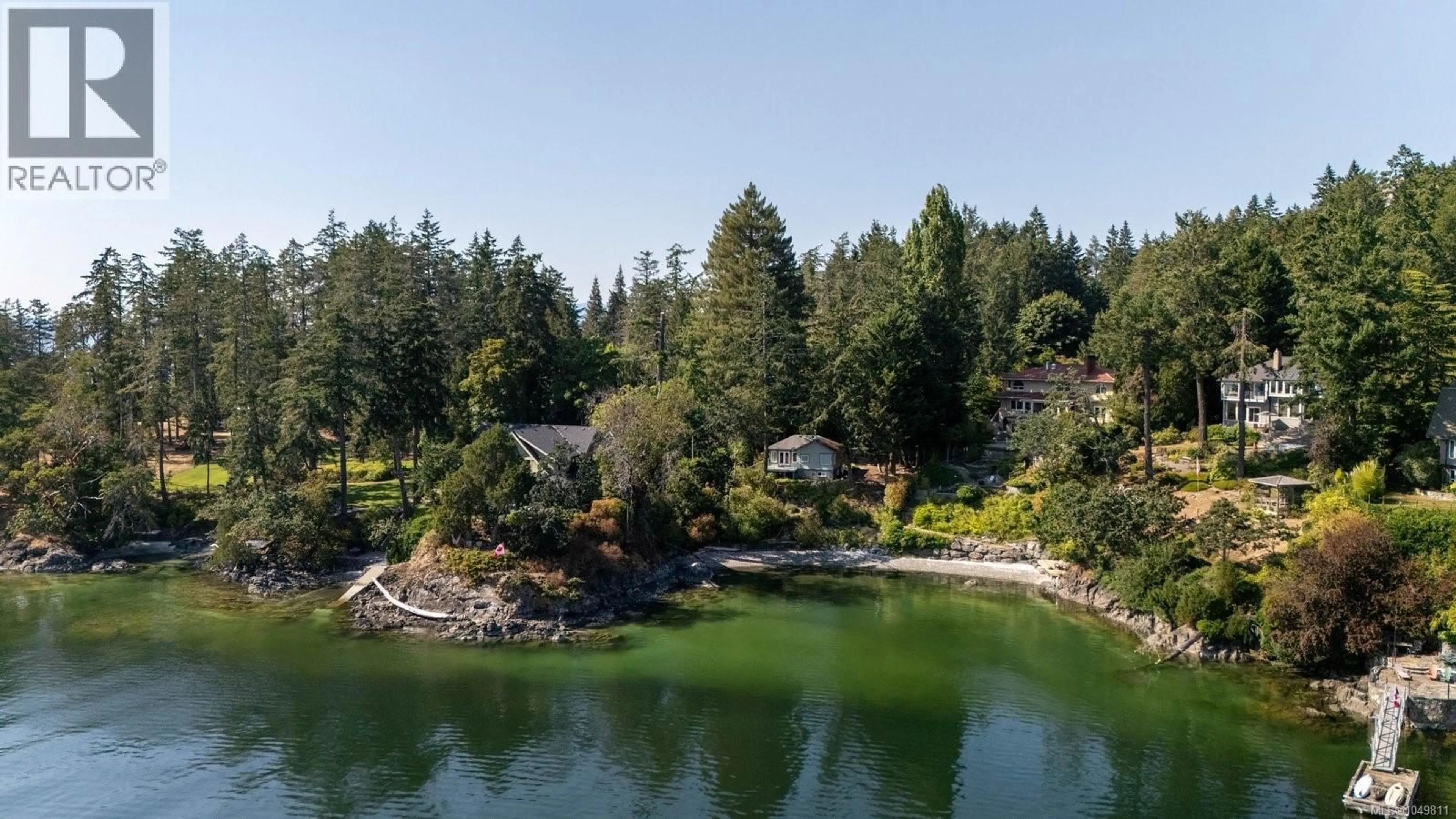 A pic from outside/outdoor area/front of a property/back of a property/a pic from drone, water/lake/river/ocean view for 389 MOSES POINT ROAD, North Saanich British Columbia V8L5L9