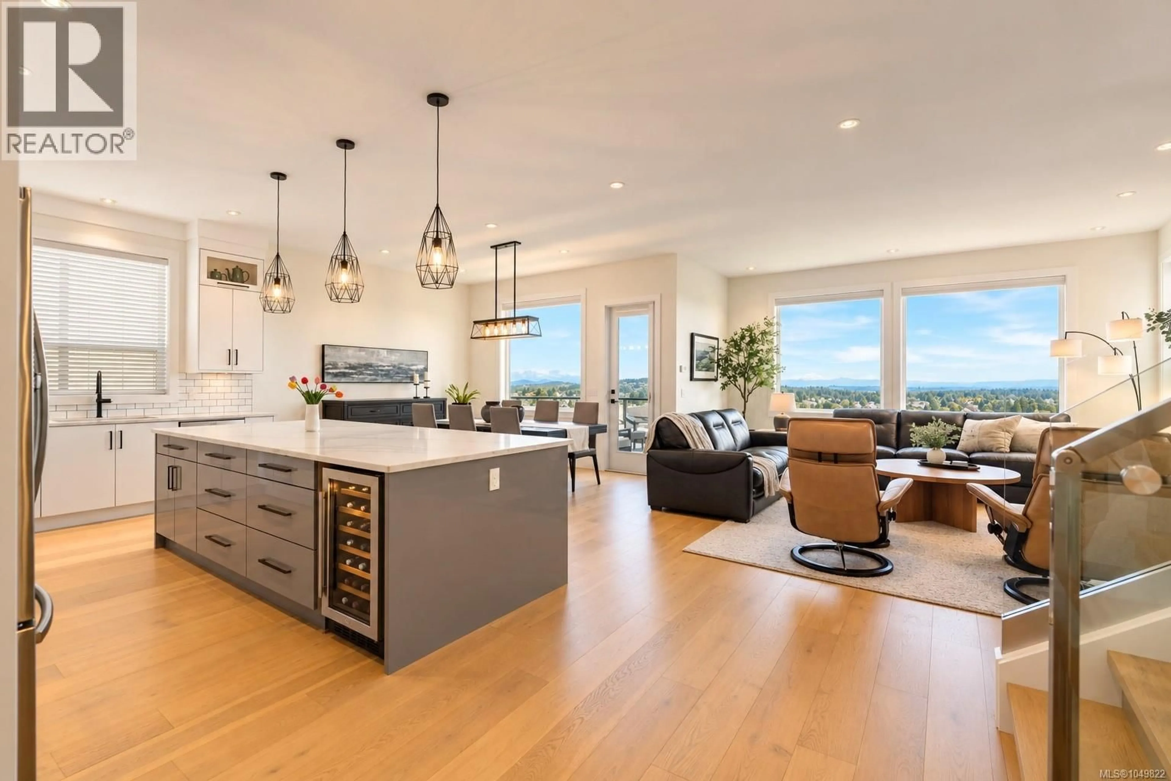 Open concept kitchen, wood/laminate floor for 2423 AZURITE CRESCENT, Langford British Columbia V9B0Z6