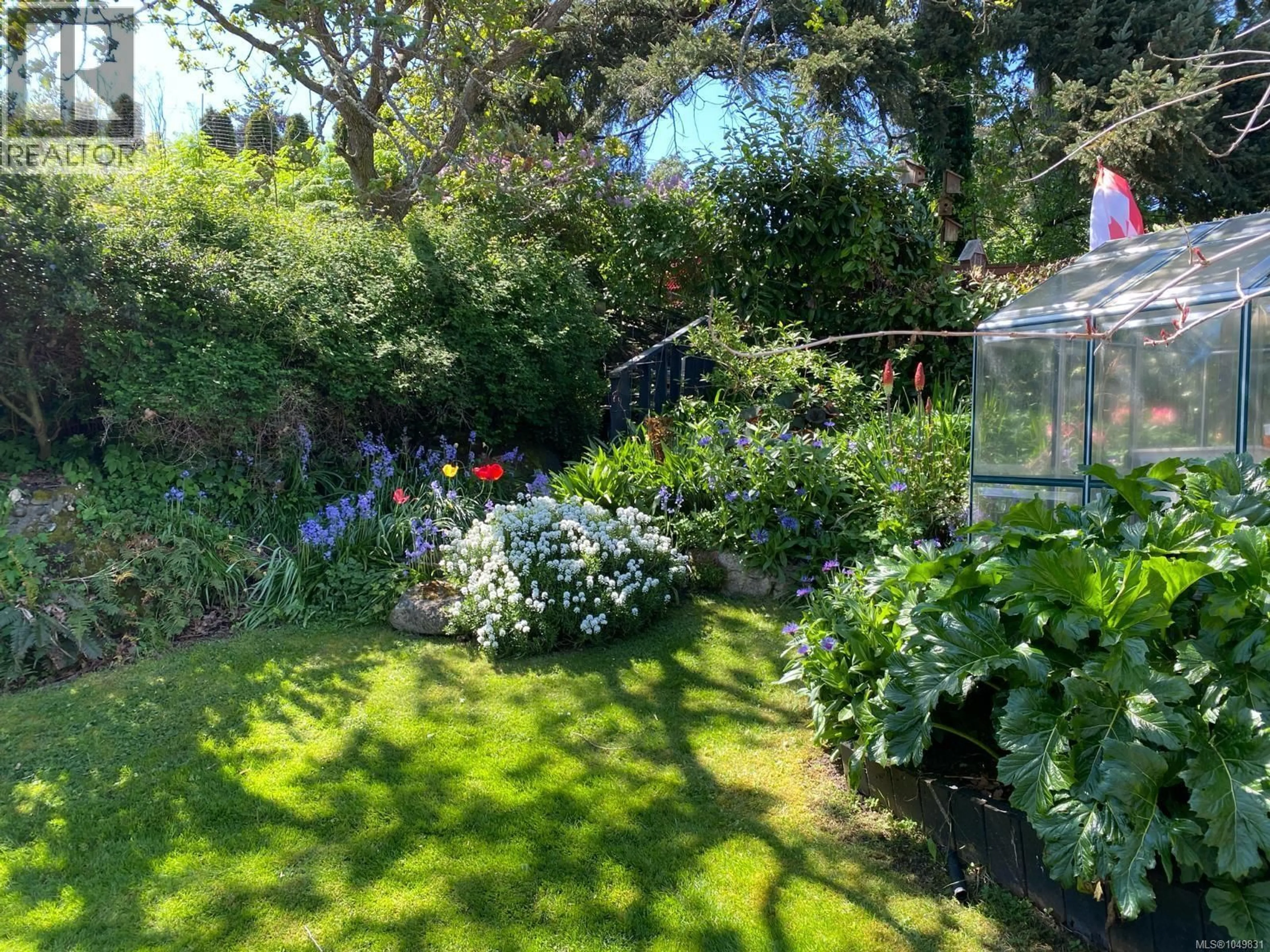 A pic from outside/outdoor area/front of a property/back of a property/a pic from drone, street for 886 CUNNINGHAM ROAD, Esquimalt British Columbia V9A4M6