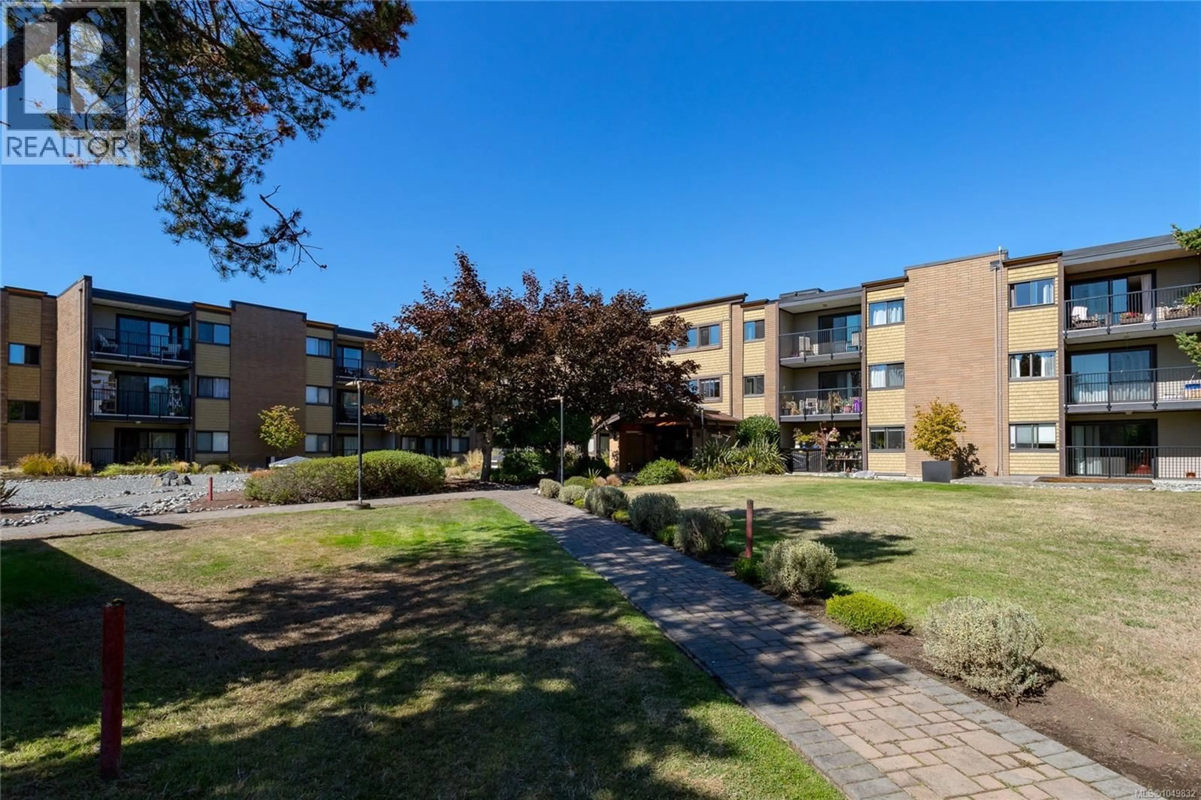 A pic from outside/outdoor area/front of a property/back of a property/a pic from drone, street for 113 - 1870 MCKENZIE AVENUE, Saanich British Columbia V8N4X3