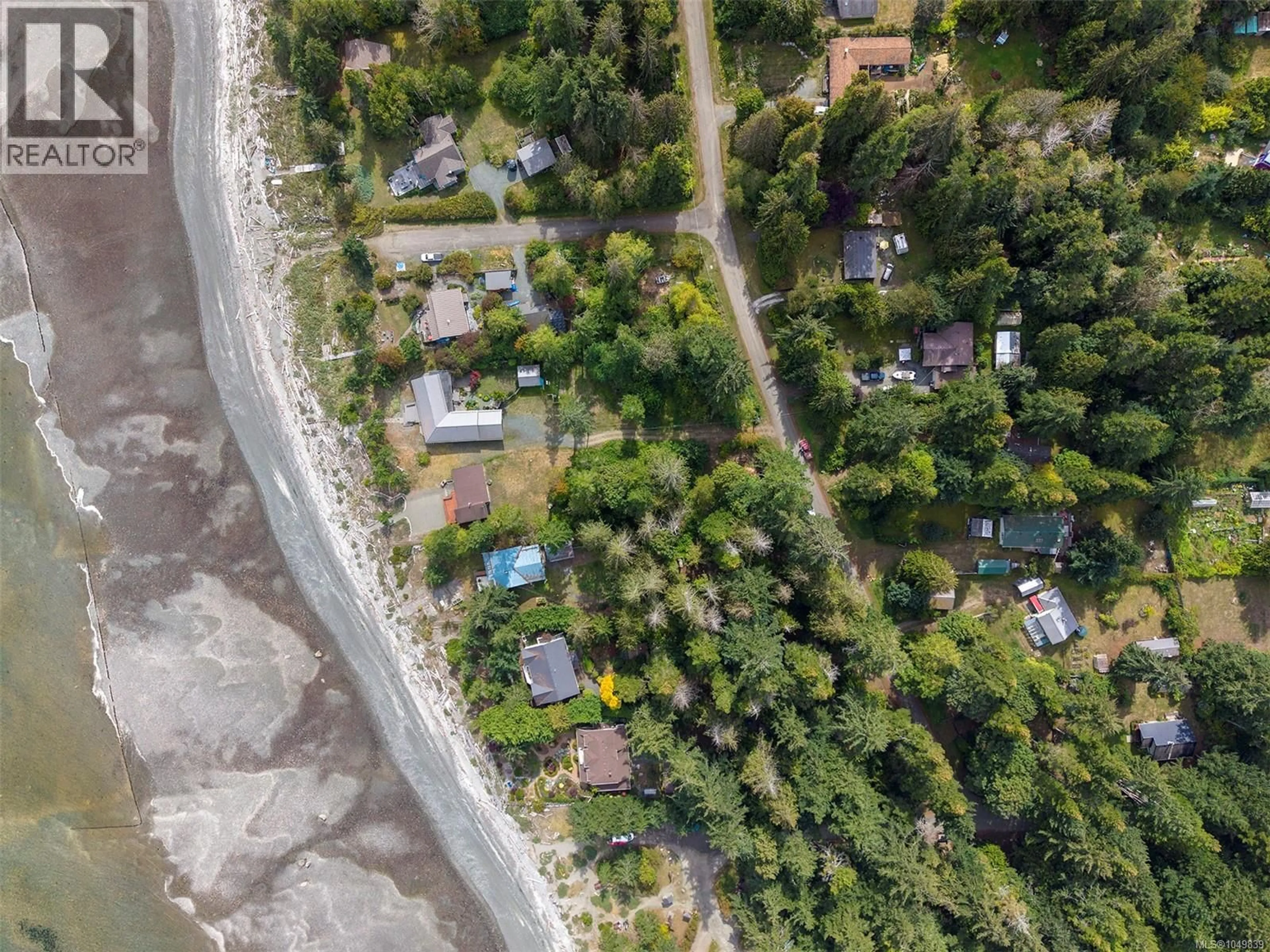 A pic from outside/outdoor area/front of a property/back of a property/a pic from drone, street for 1701 DALZIEL ROAD, Denman Island British Columbia V0R1T0