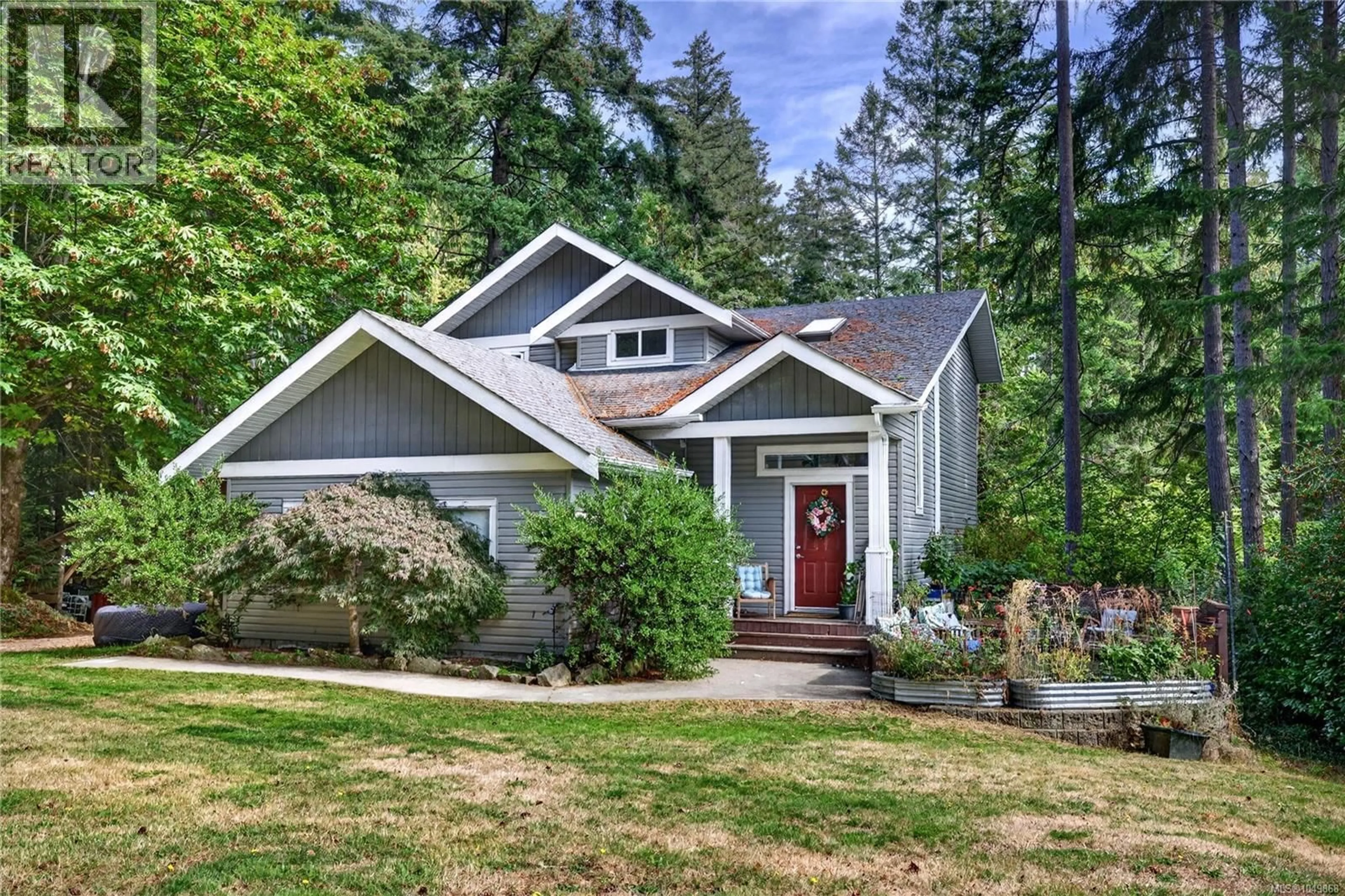 Home with vinyl exterior material, street for 135 PINE PLACE, Salt Spring British Columbia V8K2N4