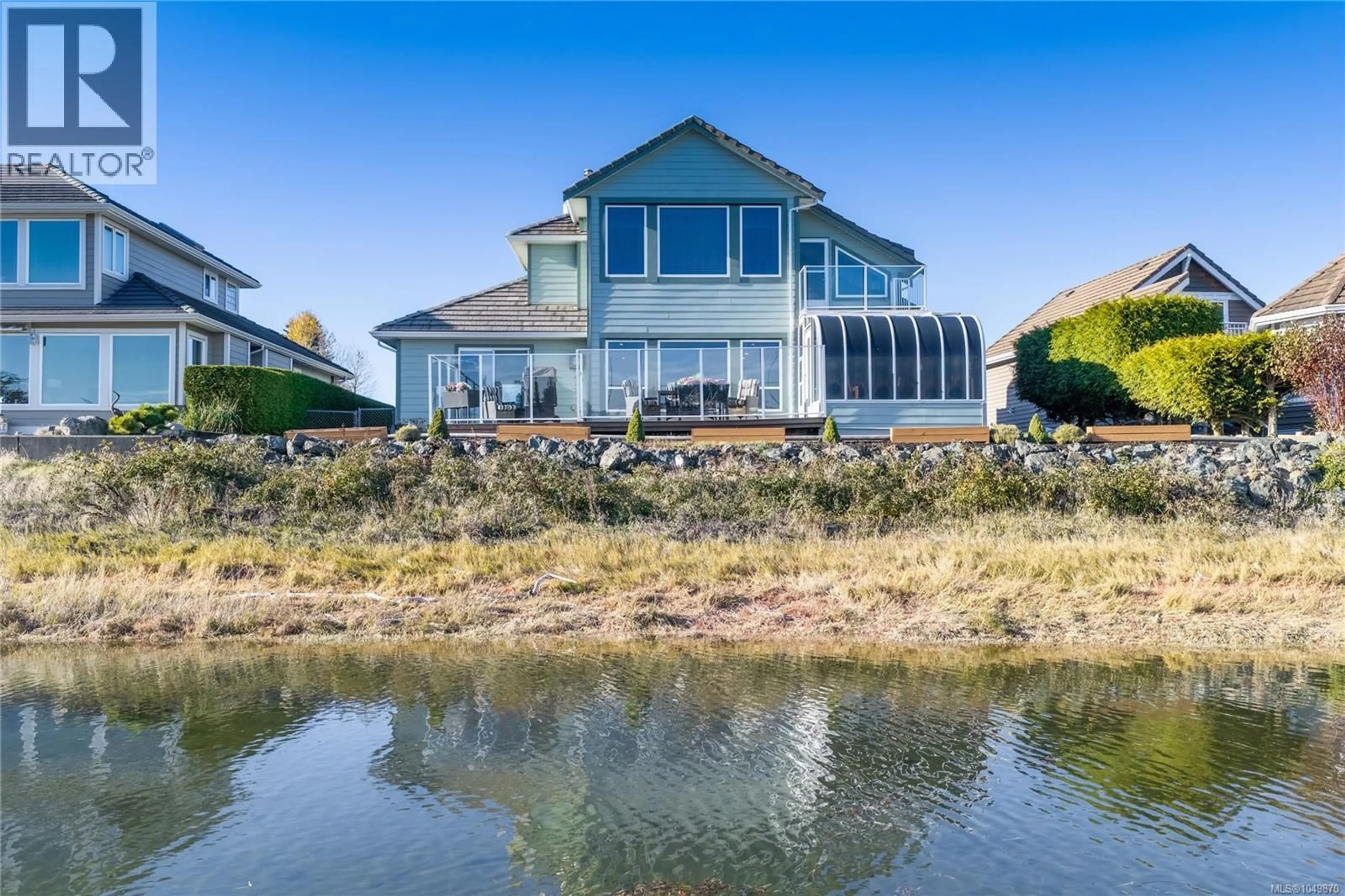 A pic from outside/outdoor area/front of a property/back of a property/a pic from drone, water/lake/river/ocean view for 1777 ADMIRAL TRYON BOULEVARD, Parksville British Columbia V9P2V2