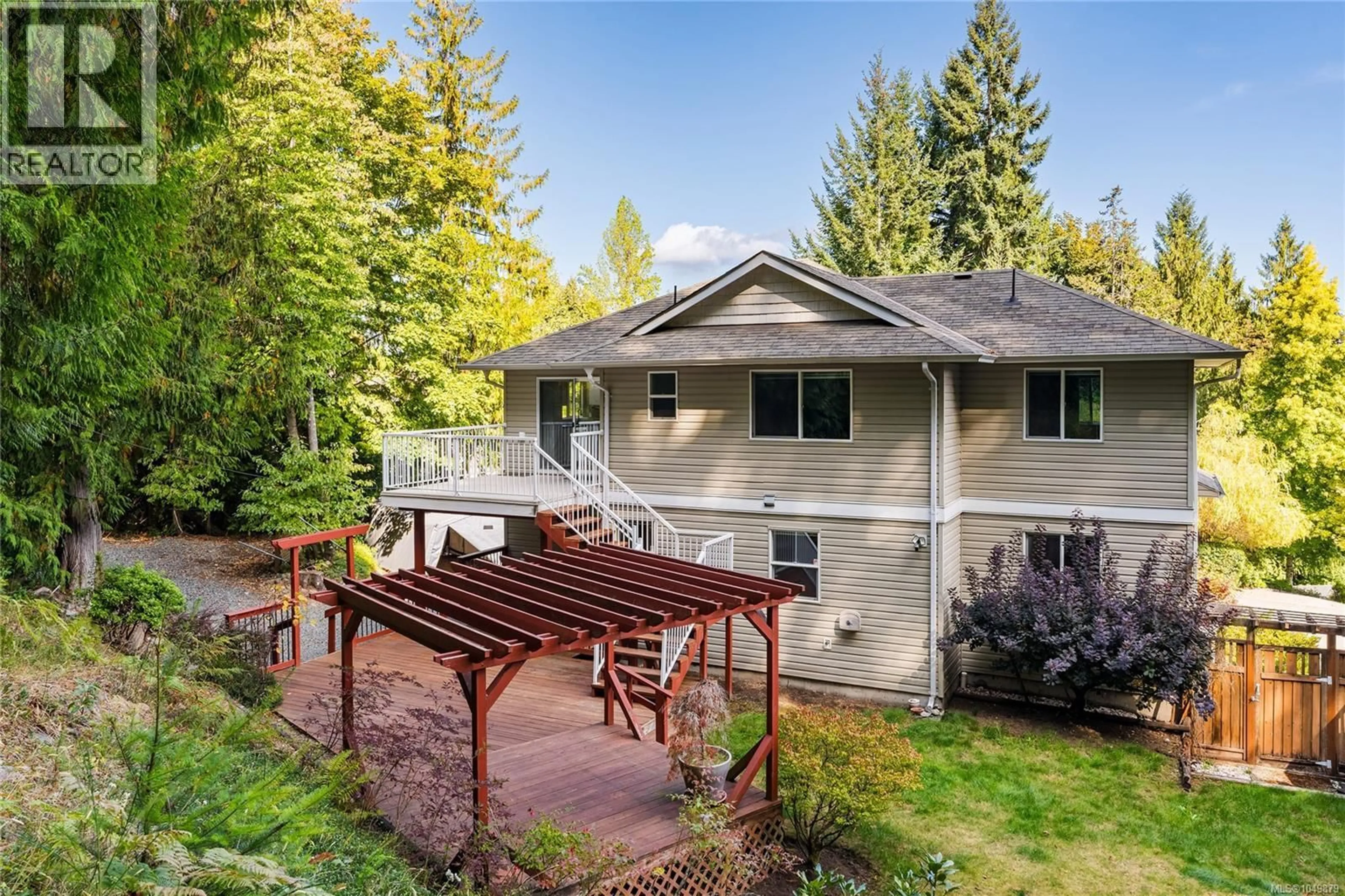 A pic from outside/outdoor area/front of a property/back of a property/a pic from drone, forest/trees view for 452 THETIS DRIVE, Ladysmith British Columbia V9G1V9
