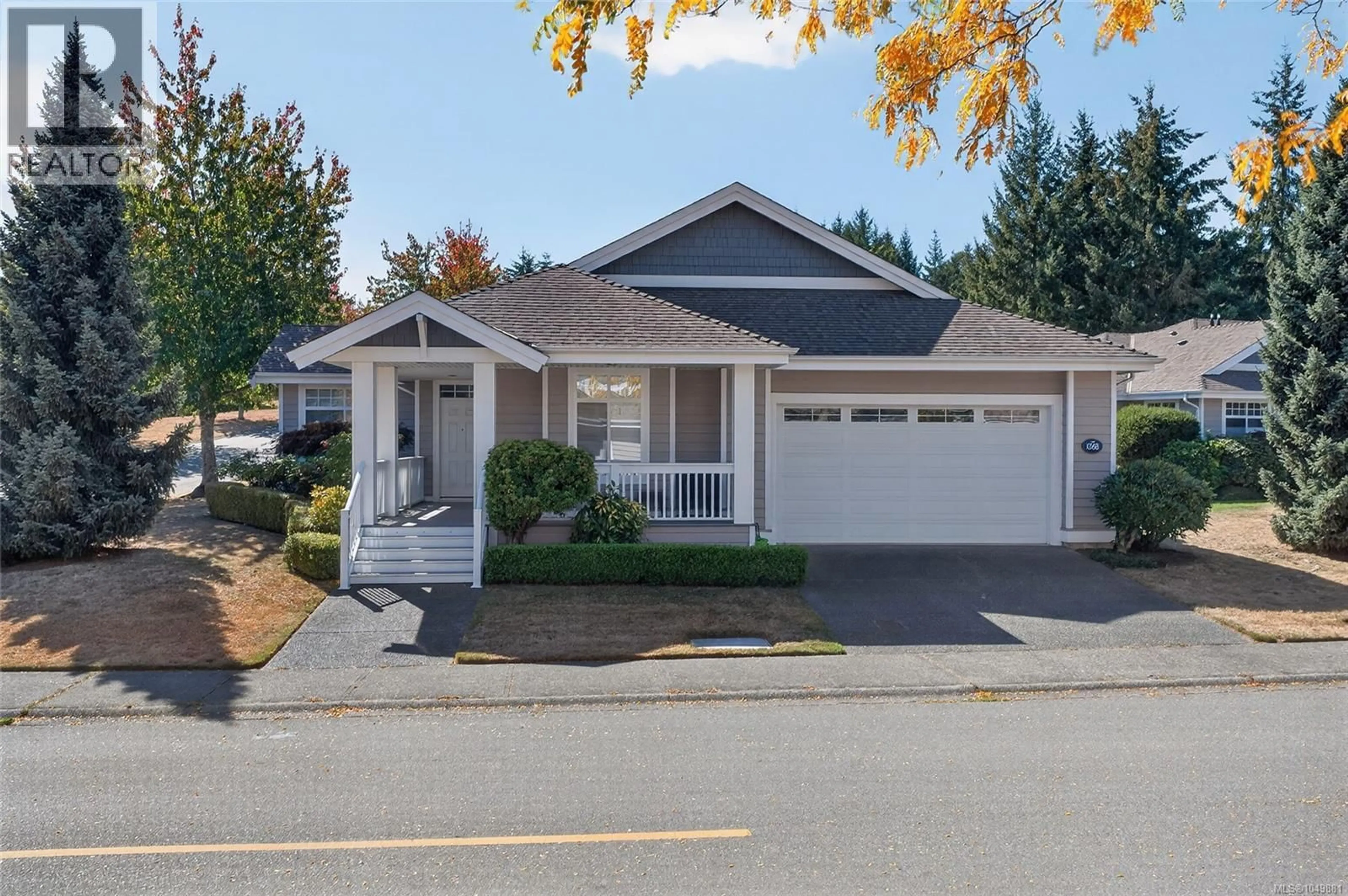Home with vinyl exterior material, street for 1368 SATURNA DRIVE, Parksville British Columbia V9P2X9