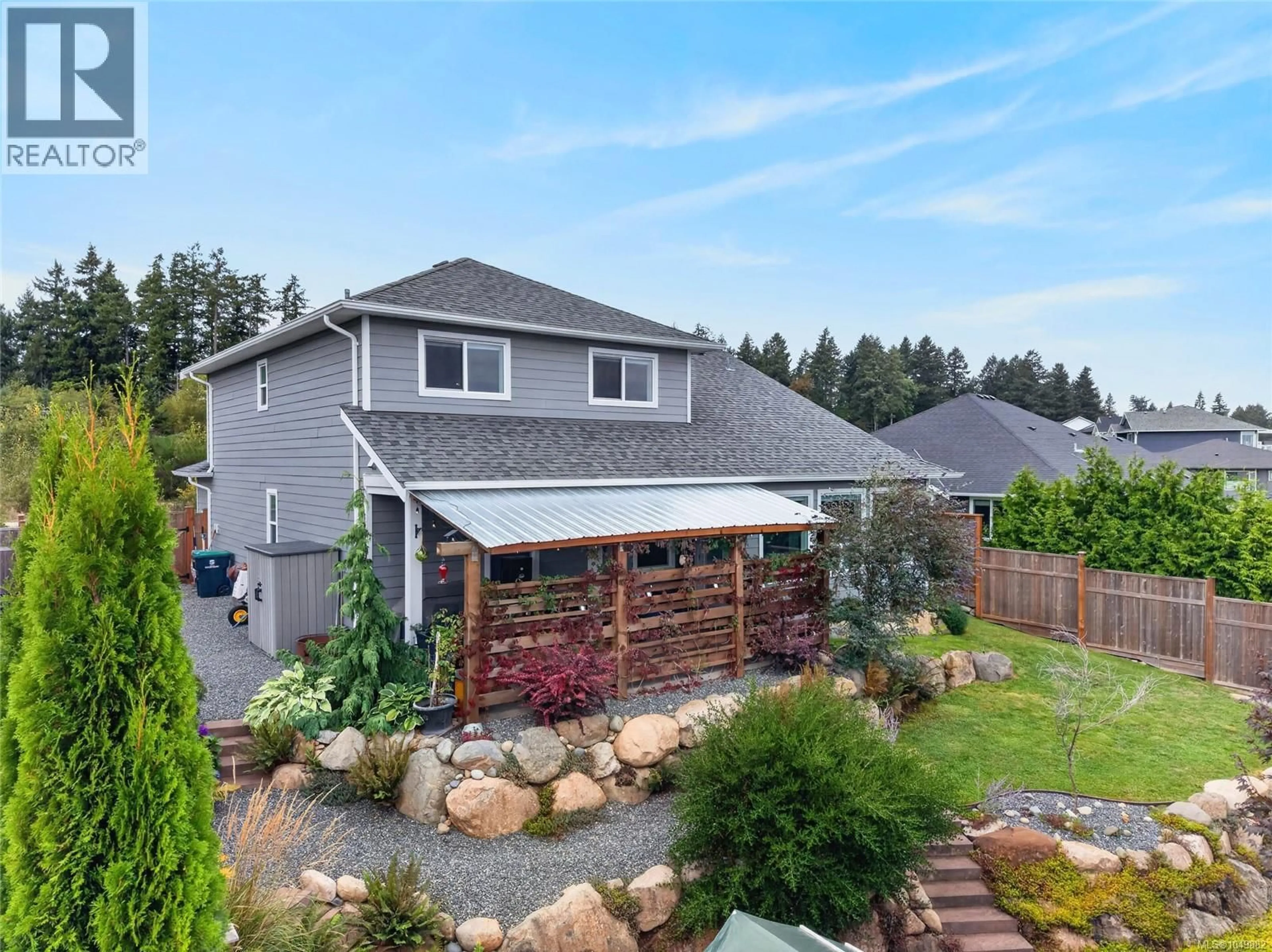 A pic from outside/outdoor area/front of a property/back of a property/a pic from drone, mountain view for 3360 HARBOURVIEW BOULEVARD, Courtenay British Columbia V9N0E8