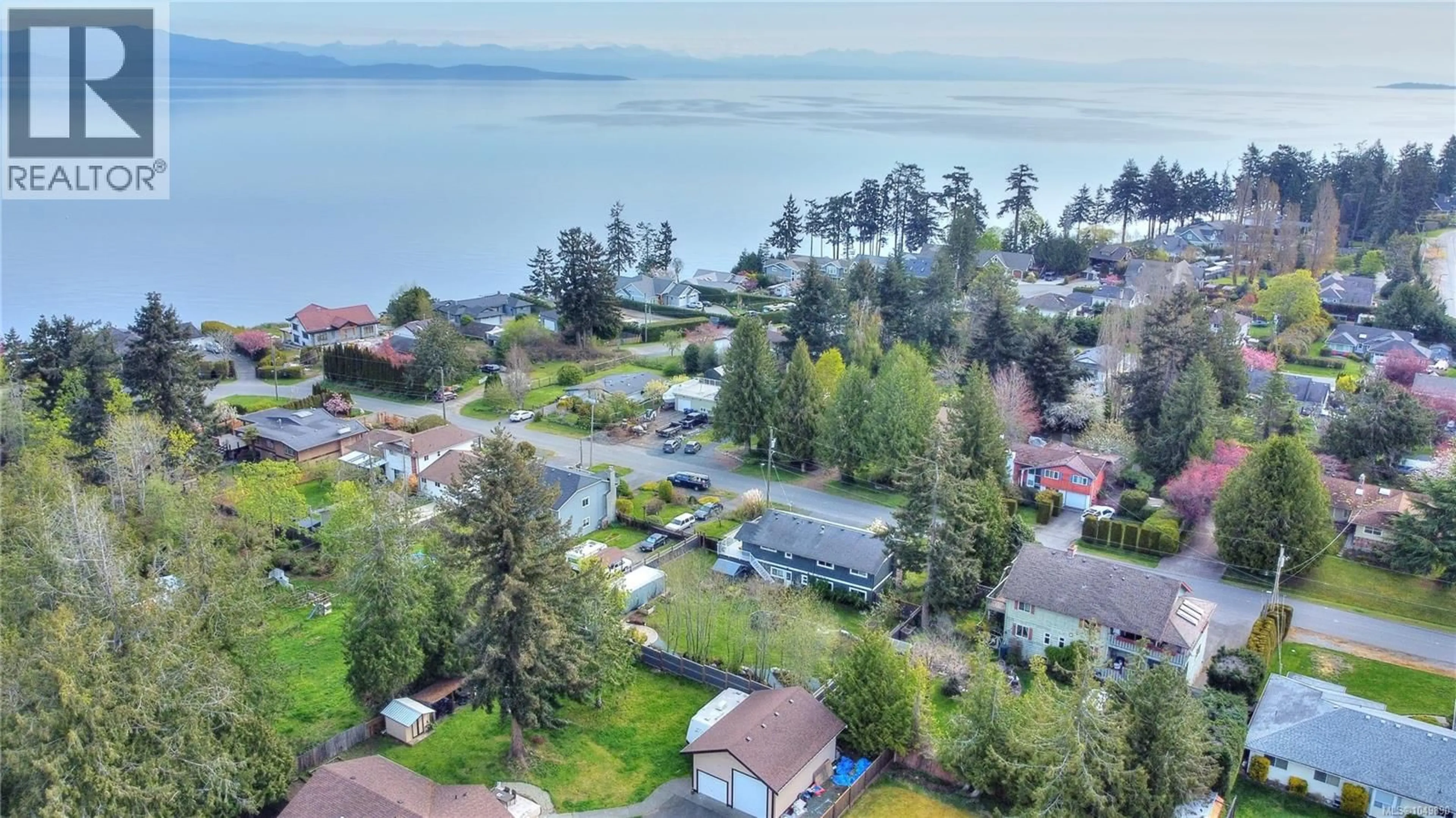 A pic from outside/outdoor area/front of a property/back of a property/a pic from drone, water/lake/river/ocean view for 853 GLENHALE CRESCENT, Parksville British Columbia V9P1Z8