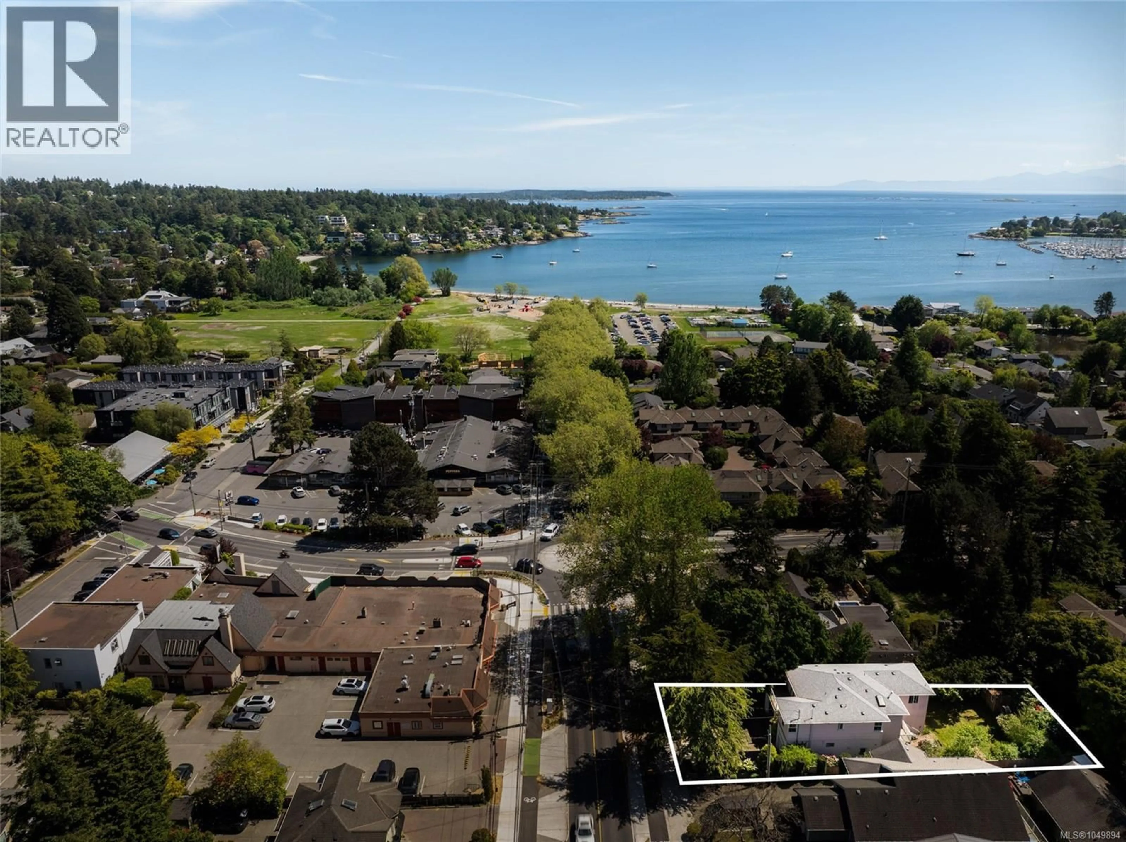 A pic from outside/outdoor area/front of a property/back of a property/a pic from drone, water/lake/river/ocean view for 2561 SINCLAIR ROAD, Saanich British Columbia V8N1B7