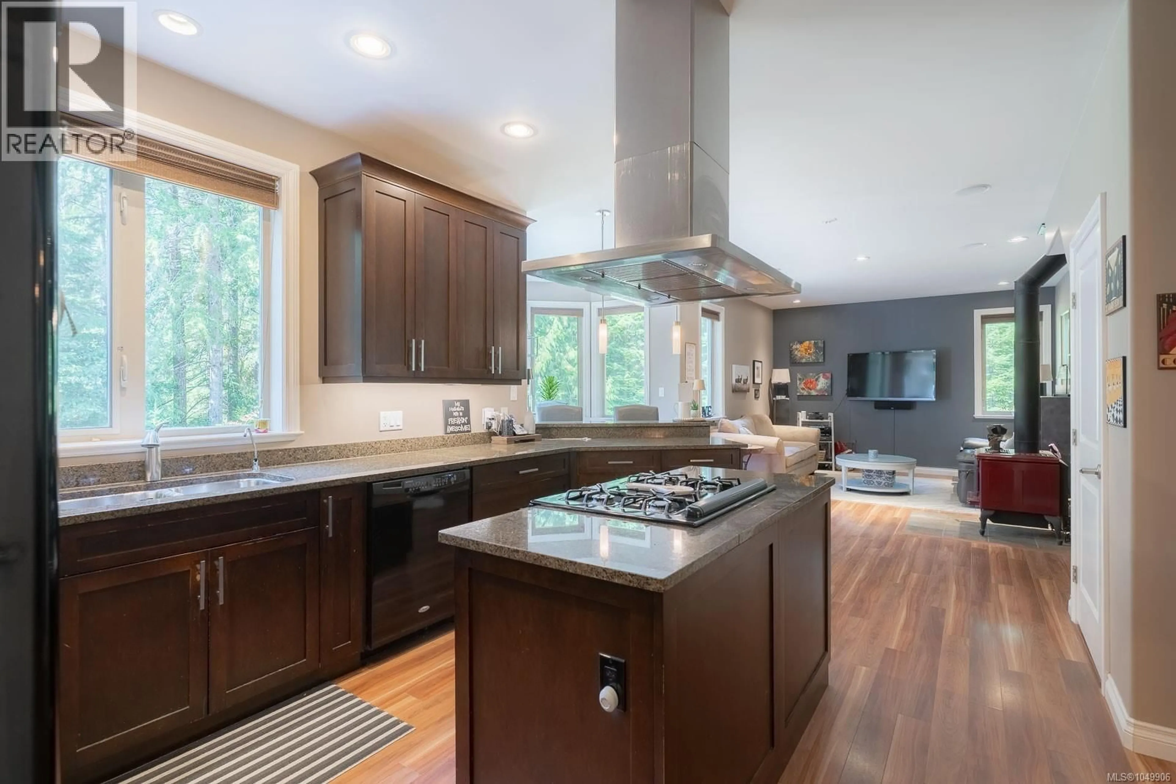 Open concept kitchen, wood/laminate floor for 9600 COMOX TRAIL, Port Alberni British Columbia V9Y8N8