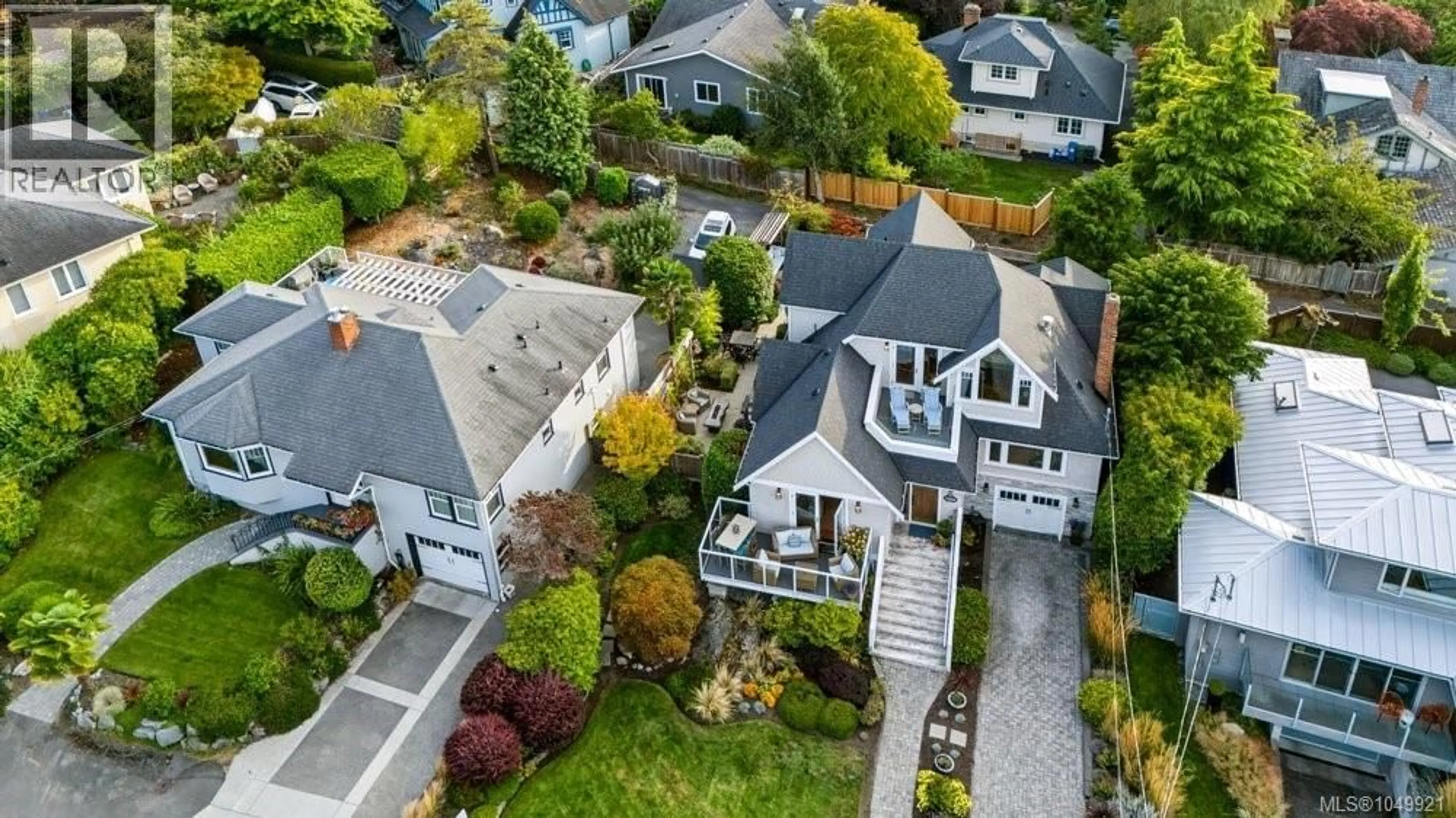 A pic from outside/outdoor area/front of a property/back of a property/a pic from drone, street for 1244 BEACH DRIVE, Oak Bay British Columbia V8S2N3