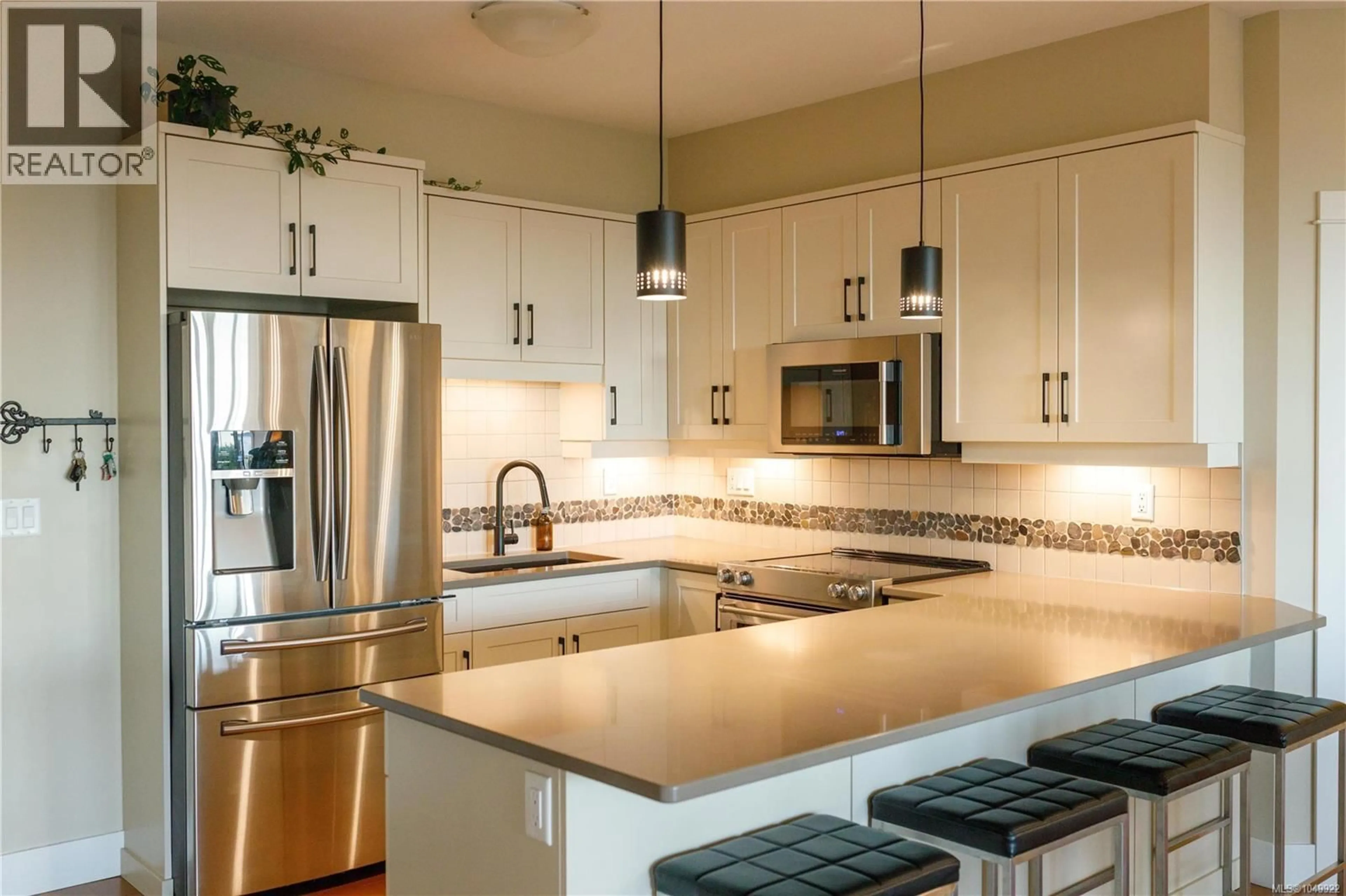 Contemporary kitchen, ceramic/tile floor for 419 - 6310 MCROBB AVENUE, Nanaimo British Columbia V9V1W8