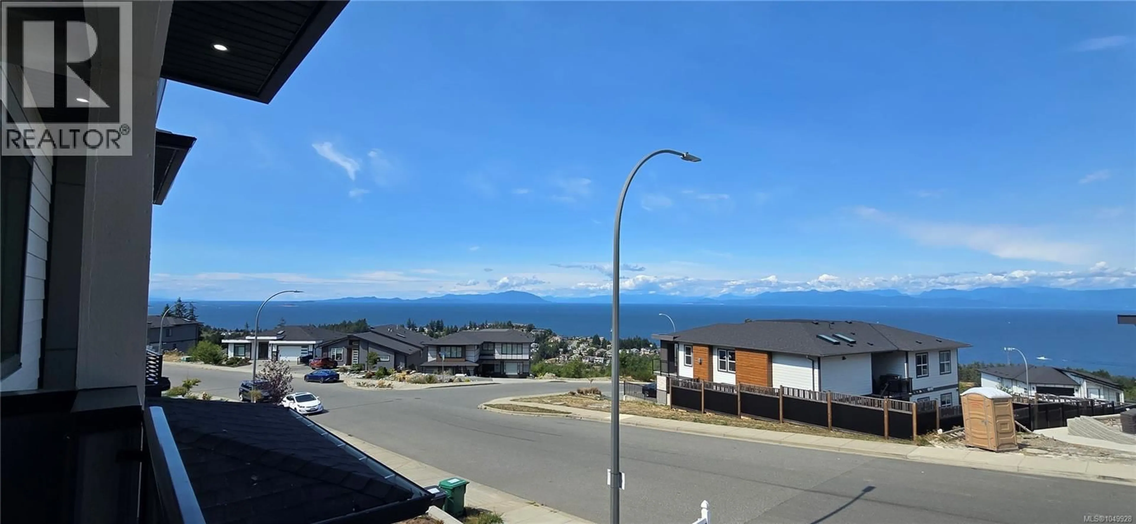 A pic from outside/outdoor area/front of a property/back of a property/a pic from drone, mountain view for 4655 AMBIENCE DRIVE, Nanaimo British Columbia V9T0L3