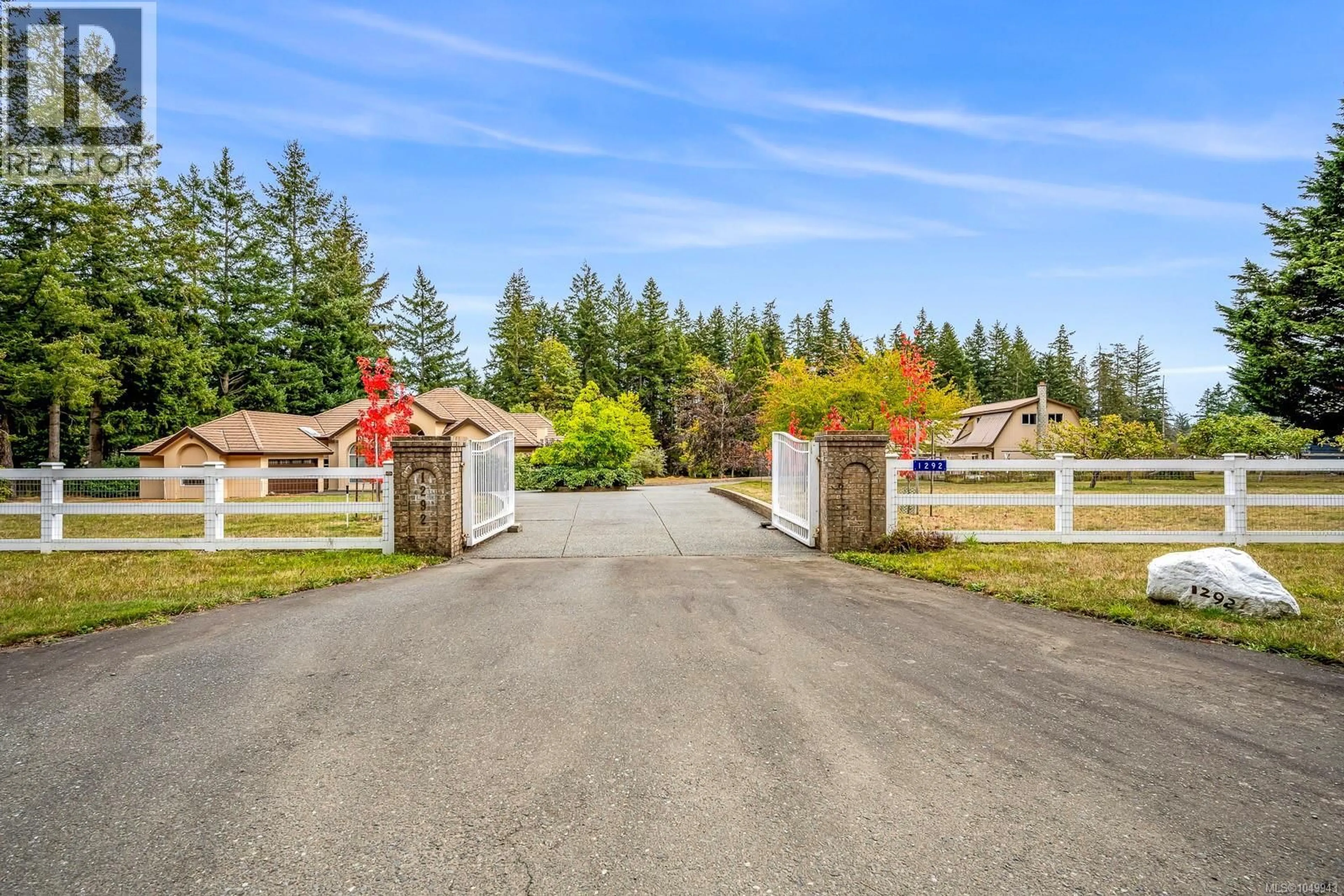 A pic from outside/outdoor area/front of a property/back of a property/a pic from drone, street for 1292 HUDSON ROAD, Comox British Columbia V9M4A1