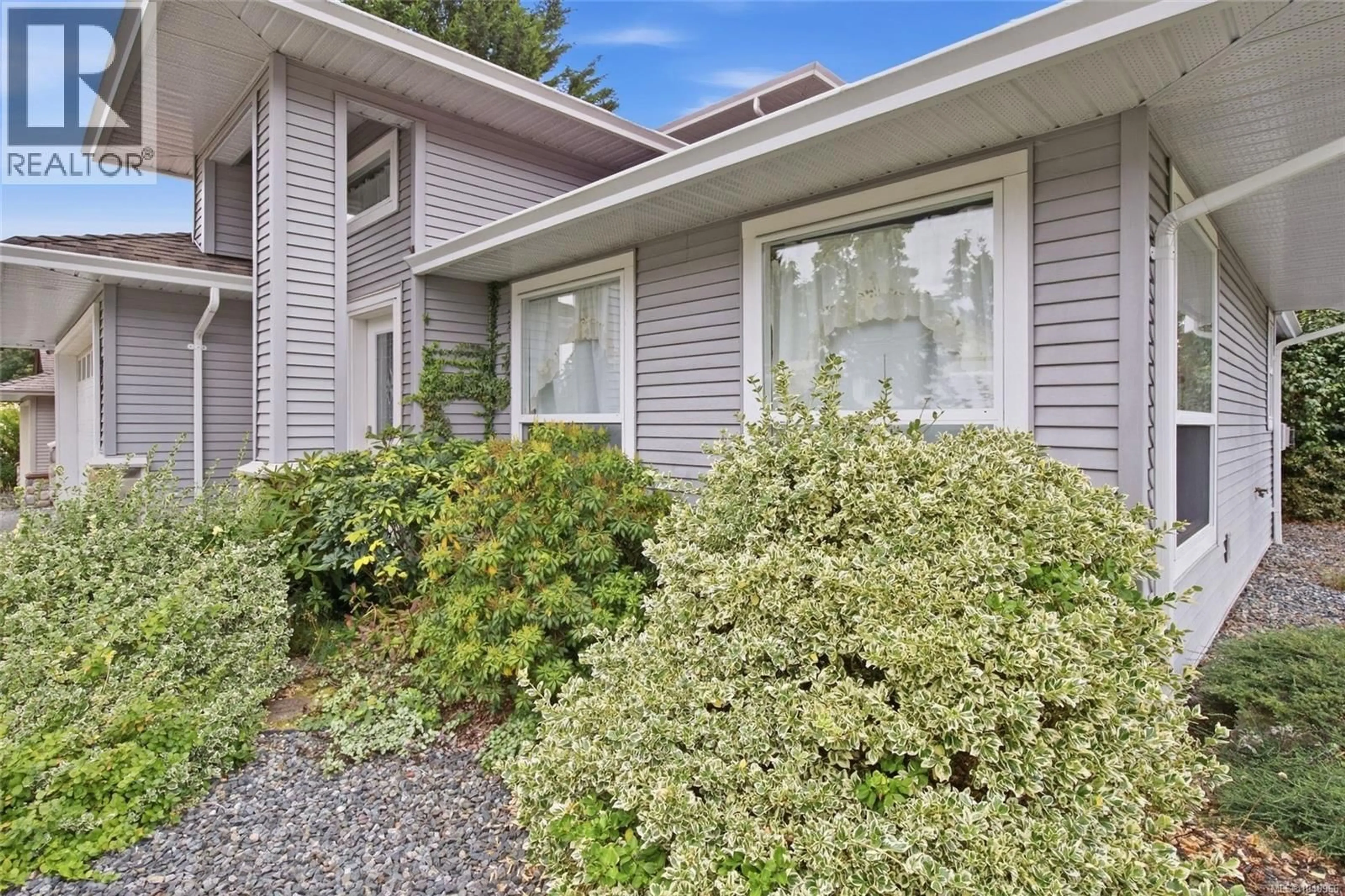Home with vinyl exterior material, street for 1863 WHITE BLOSSOM WAY, Nanaimo British Columbia V9X1X5