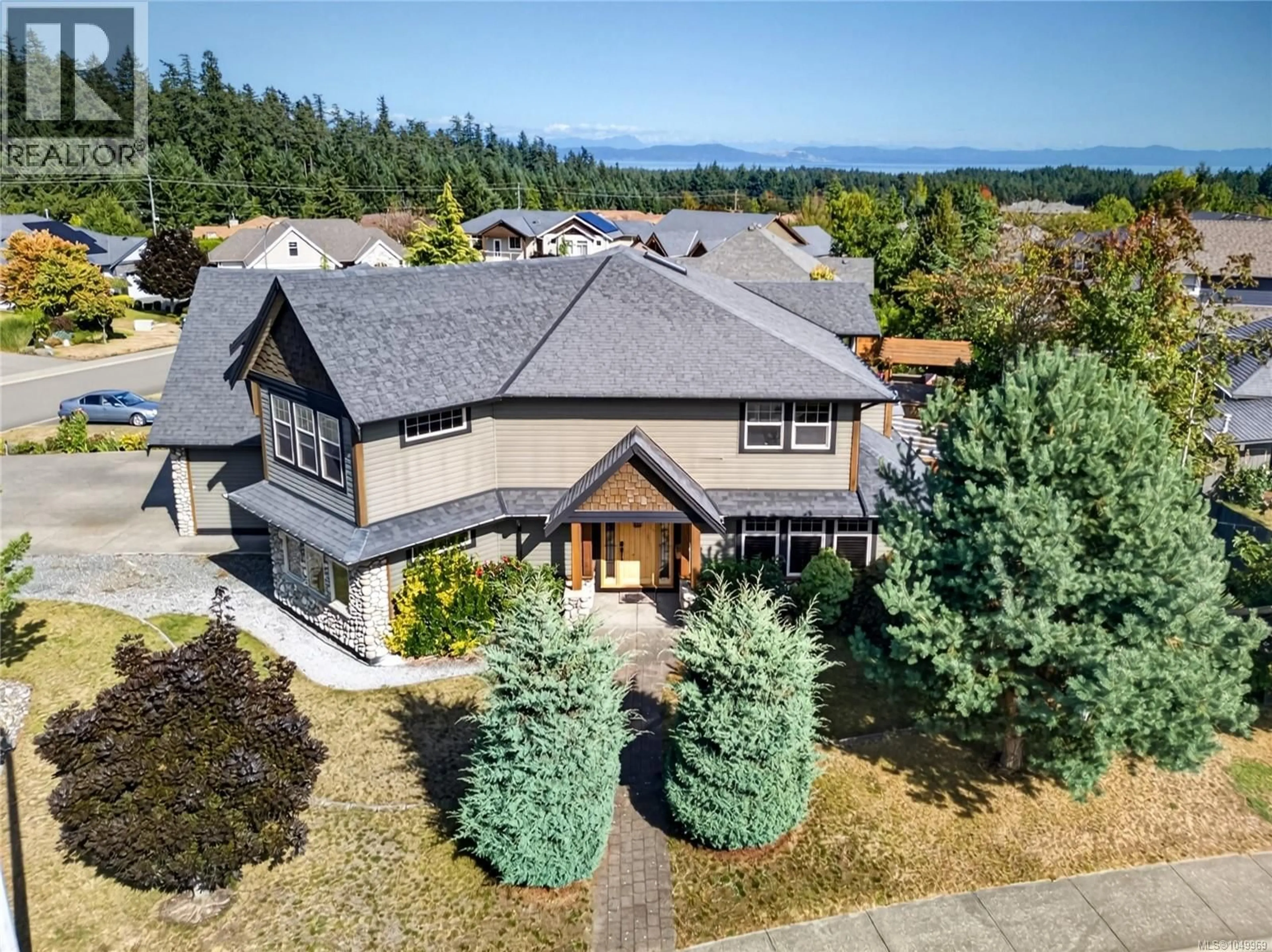 A pic from outside/outdoor area/front of a property/back of a property/a pic from drone, mountain view for 1321 CLEAR VIEW PLACE, Comox British Columbia V9M3R3