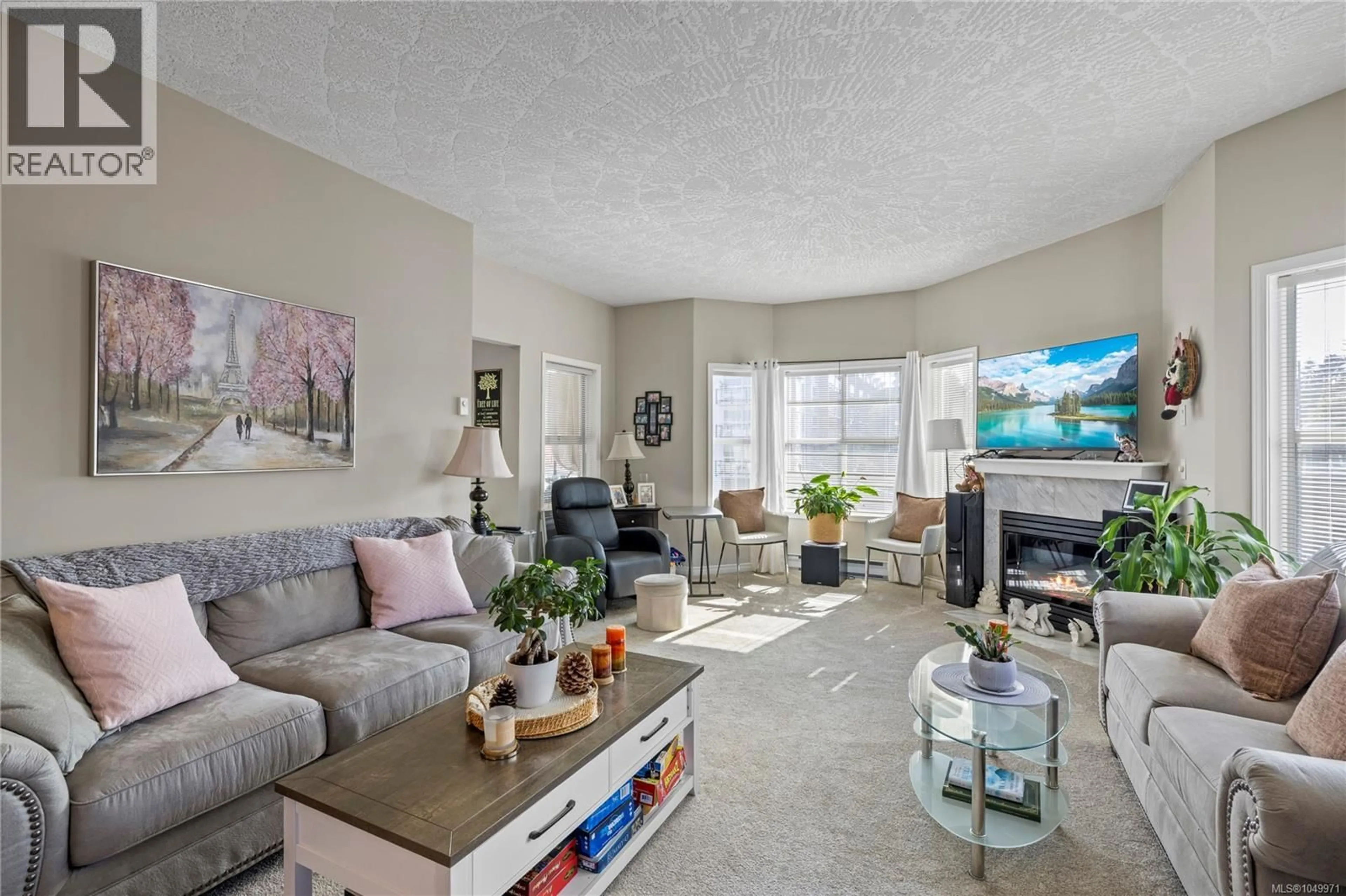 Living room with furniture, unknown for 405 - 220 ISLAND HIGHWAY WEST, Parksville British Columbia V9P2P3