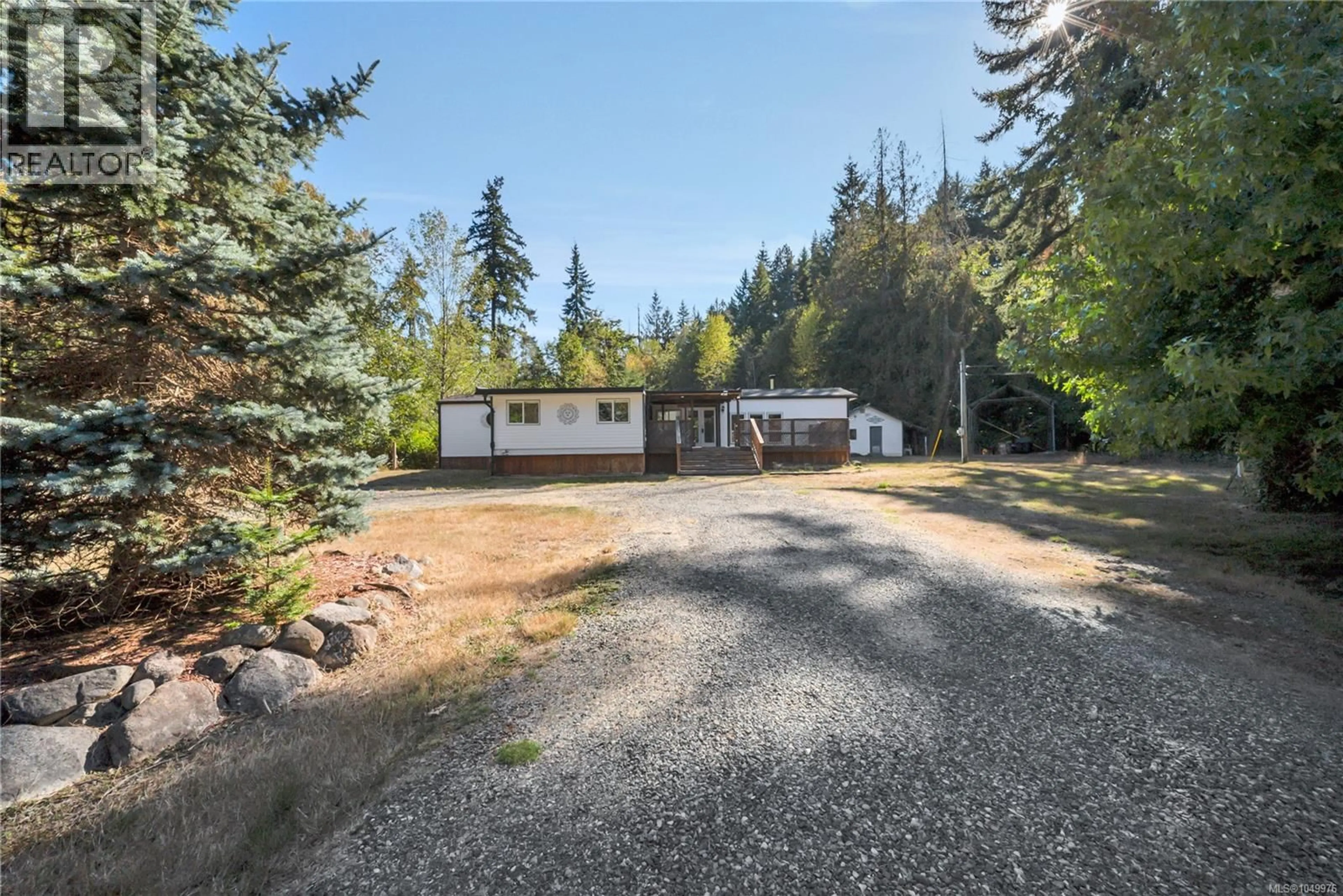 A pic from outside/outdoor area/front of a property/back of a property/a pic from drone, forest/trees view for 1320 ENGLISHMAN RIVER ROAD, Errington British Columbia V0R1V0