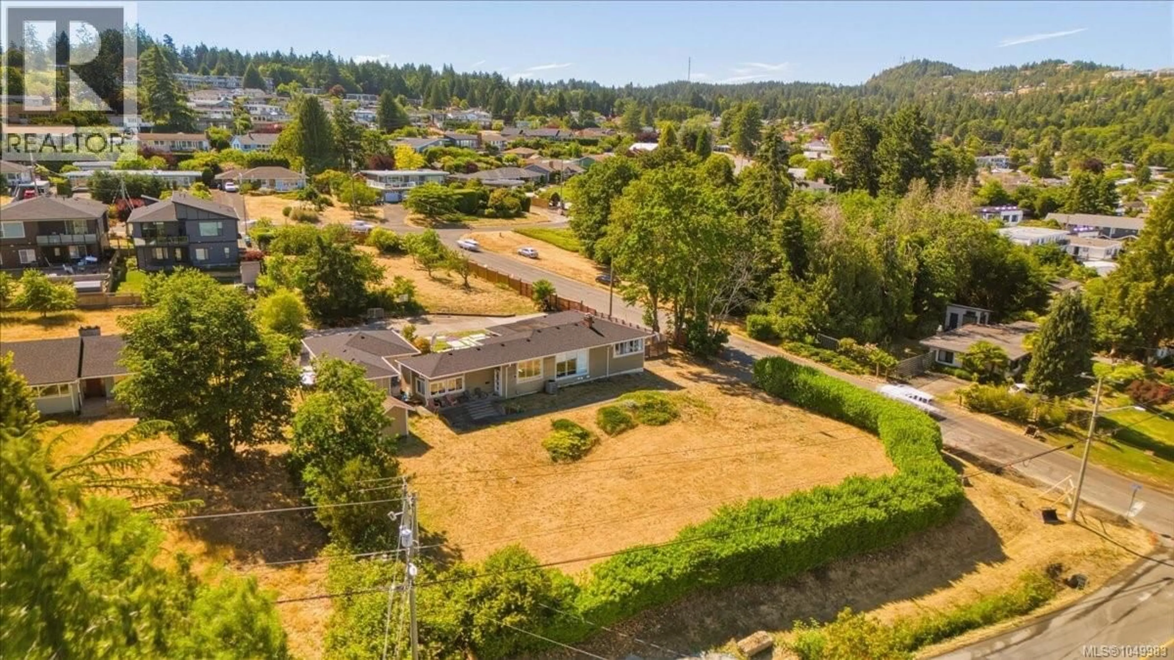 A pic from outside/outdoor area/front of a property/back of a property/a pic from drone, unknown for 2565 DEPARTURE BAY ROAD, Nanaimo British Columbia V9S3W2