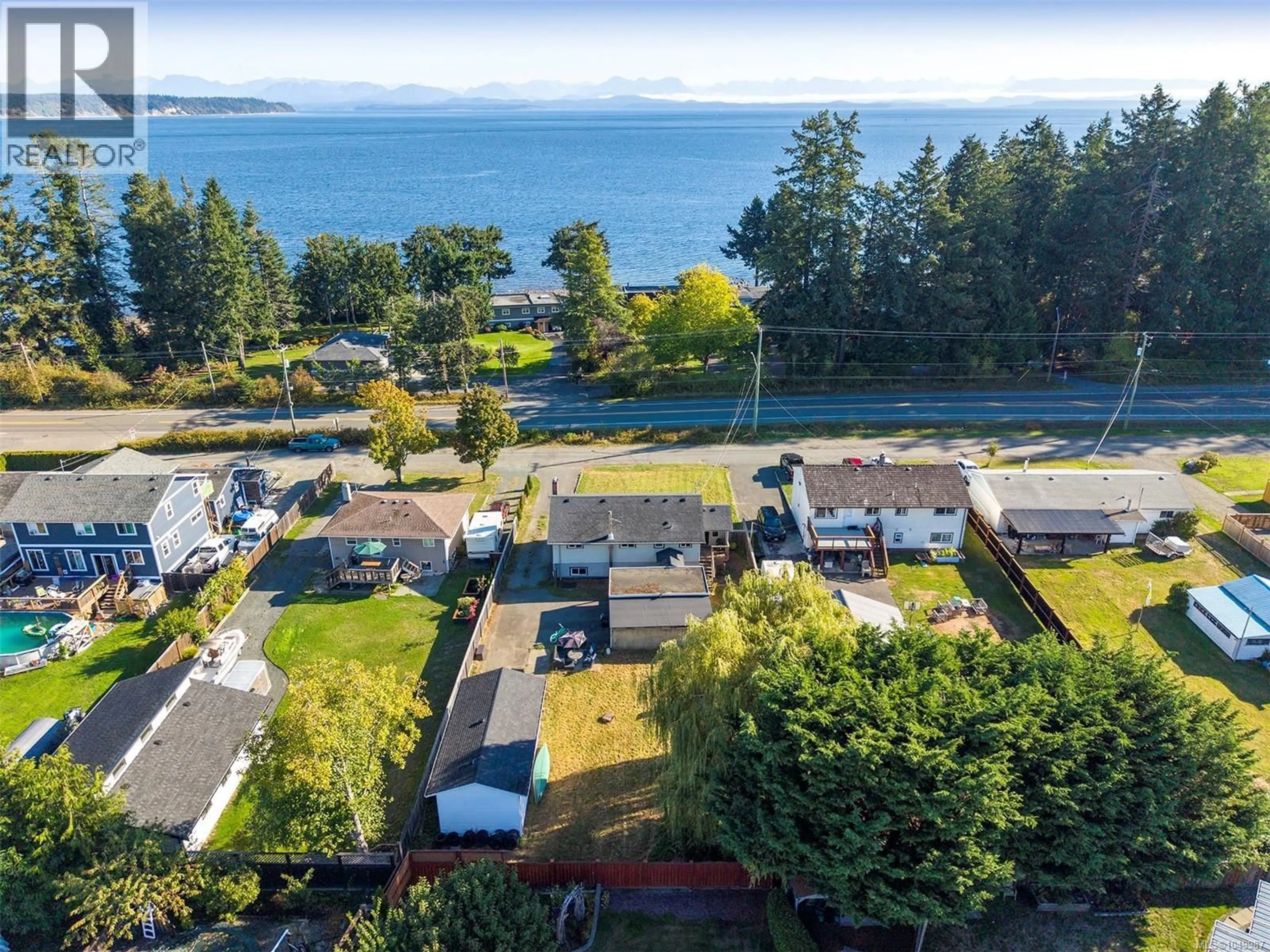 A pic from outside/outdoor area/front of a property/back of a property/a pic from drone, water/lake/river/ocean view for 3648 ISLAND HIGHWAY SOUTH, Campbell River British Columbia V9W1E6