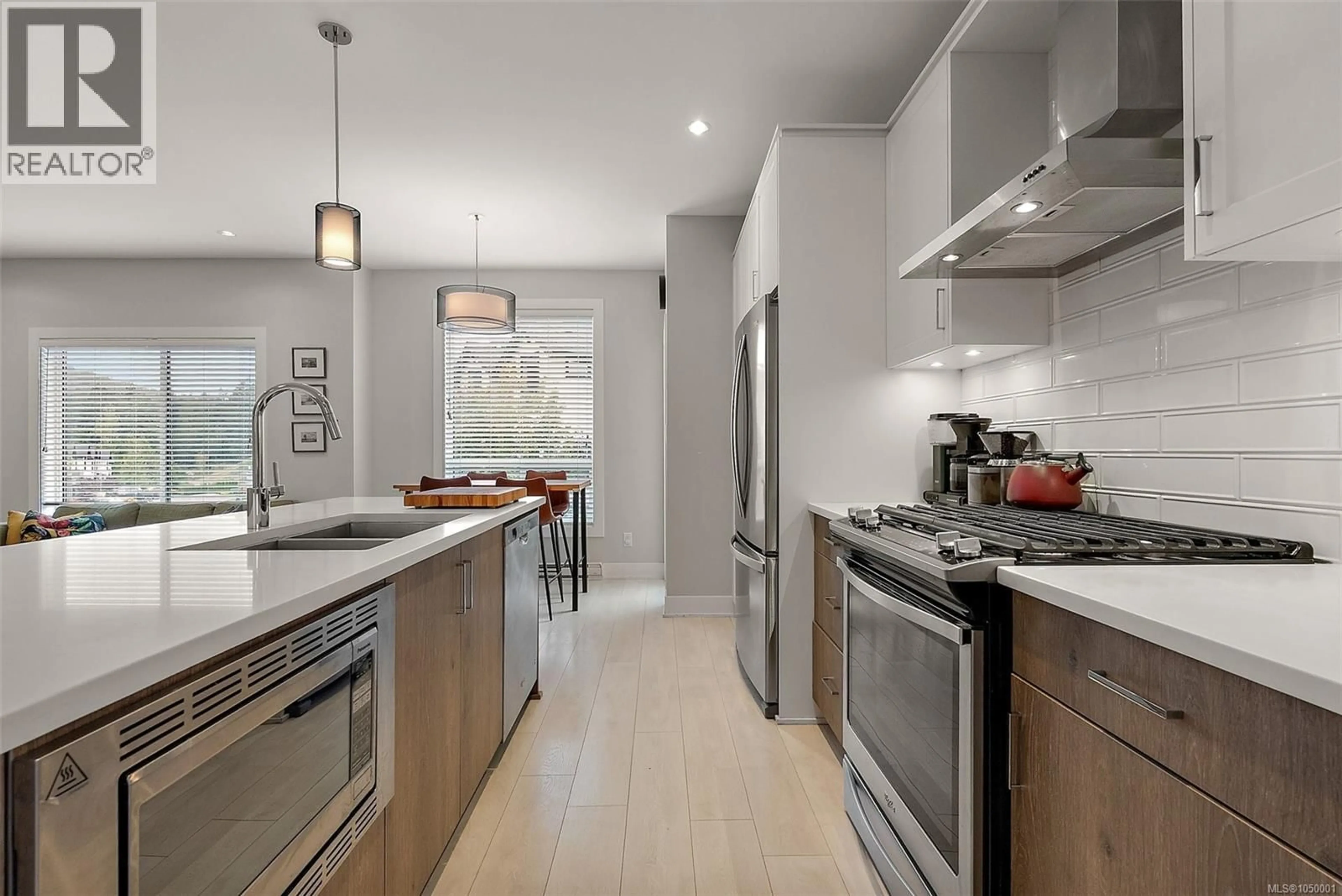 Contemporary kitchen, ceramic/tile floor for 2805 LUNAR COURT, Langford British Columbia V9B4M2