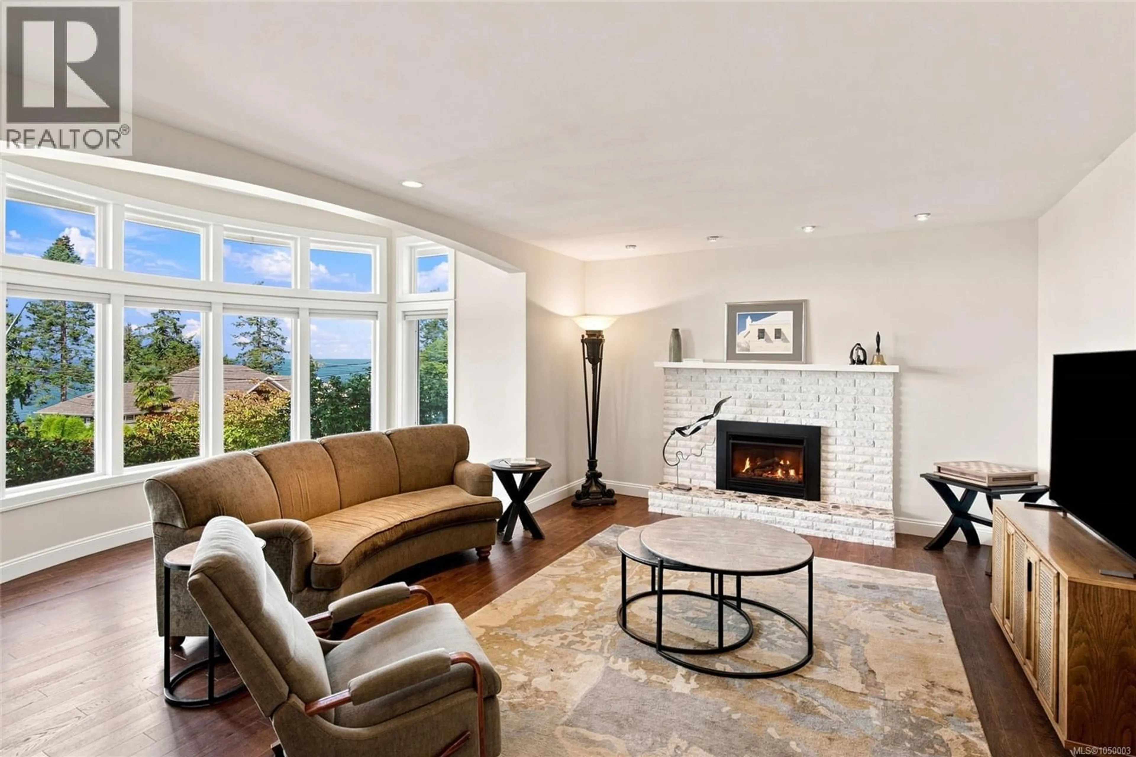 Living room with furniture, ceramic/tile floor for 5455 BAYSHORE DRIVE, Nanaimo British Columbia V9V1G8