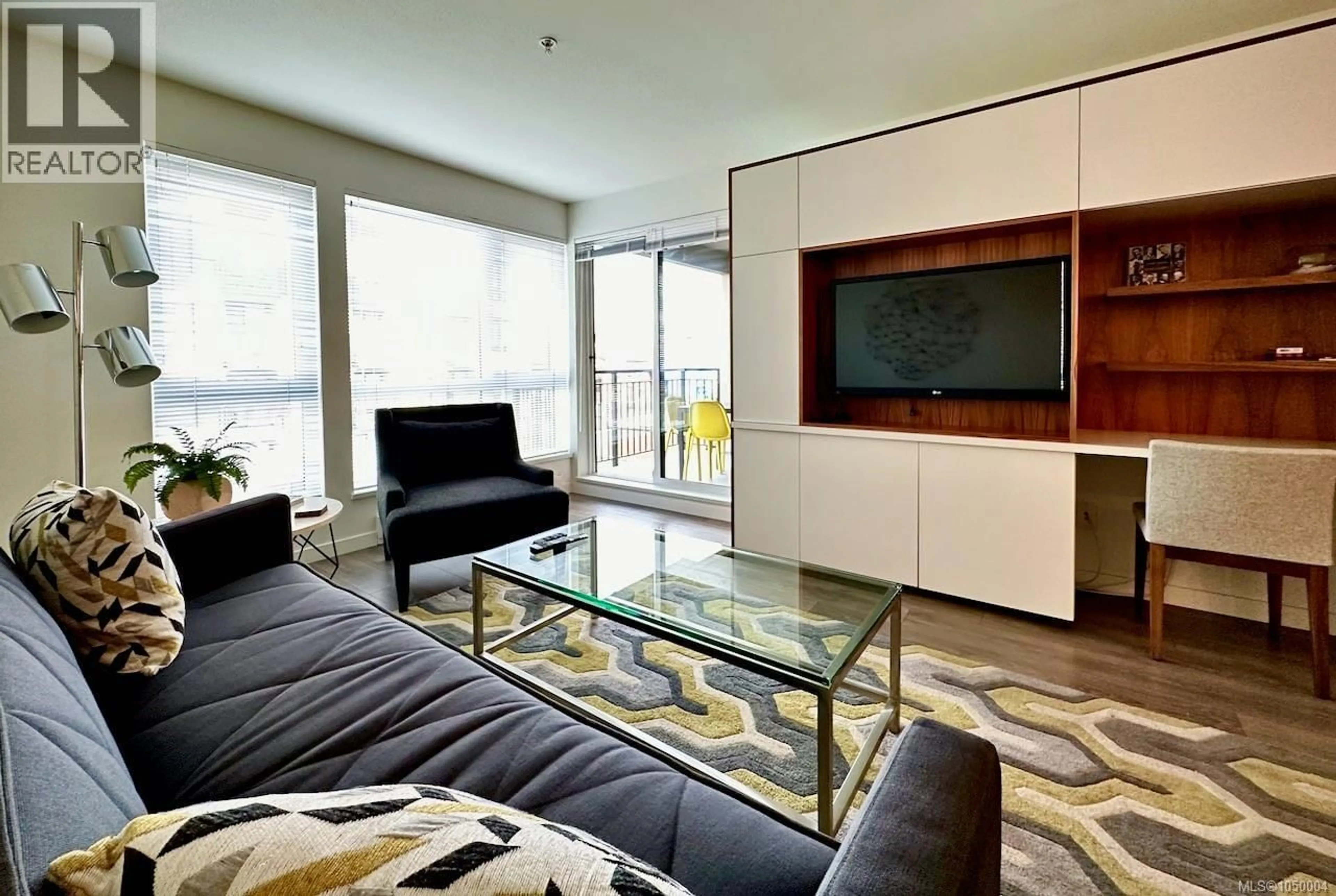 Living room with furniture, unknown for 408 - 528 PANDORA AVENUE, Victoria British Columbia V8W0C6