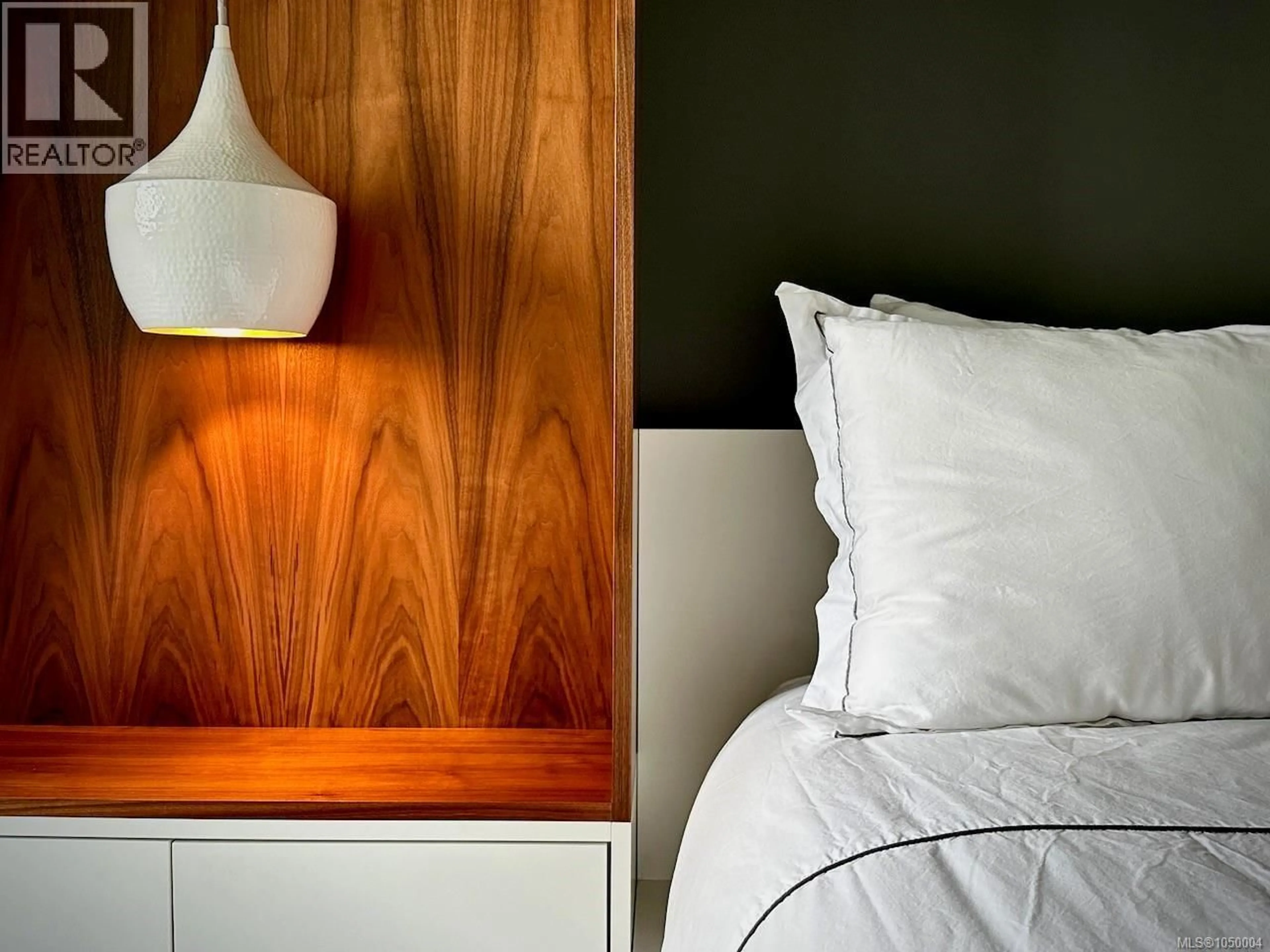 Bedroom with bed, wood/laminate floor for 408 - 528 PANDORA AVENUE, Victoria British Columbia V8W0C6