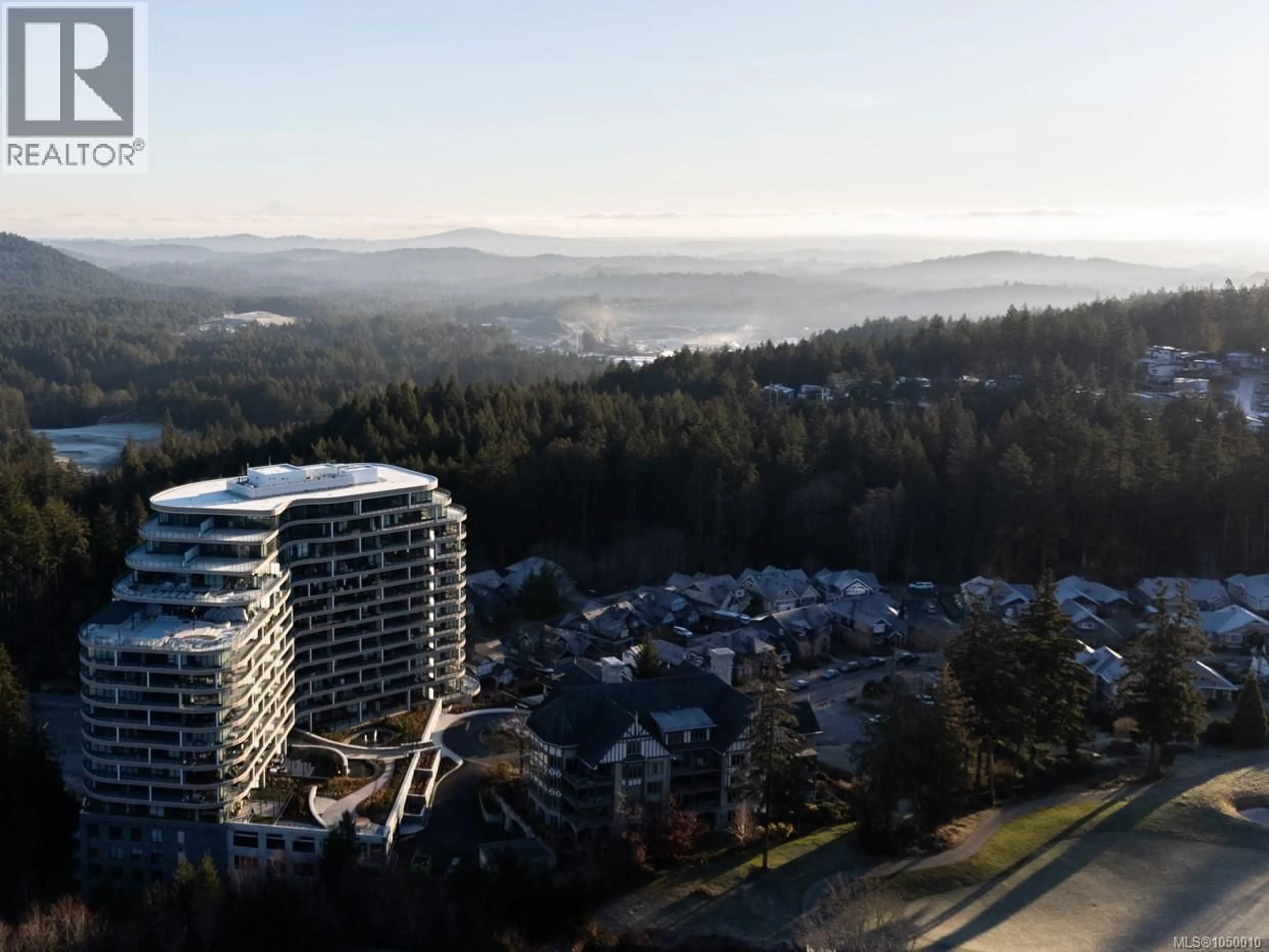 A pic from outside/outdoor area/front of a property/back of a property/a pic from drone, mountain view for 605 - 2000 HANNINGTON ROAD, Langford British Columbia V9B6R6