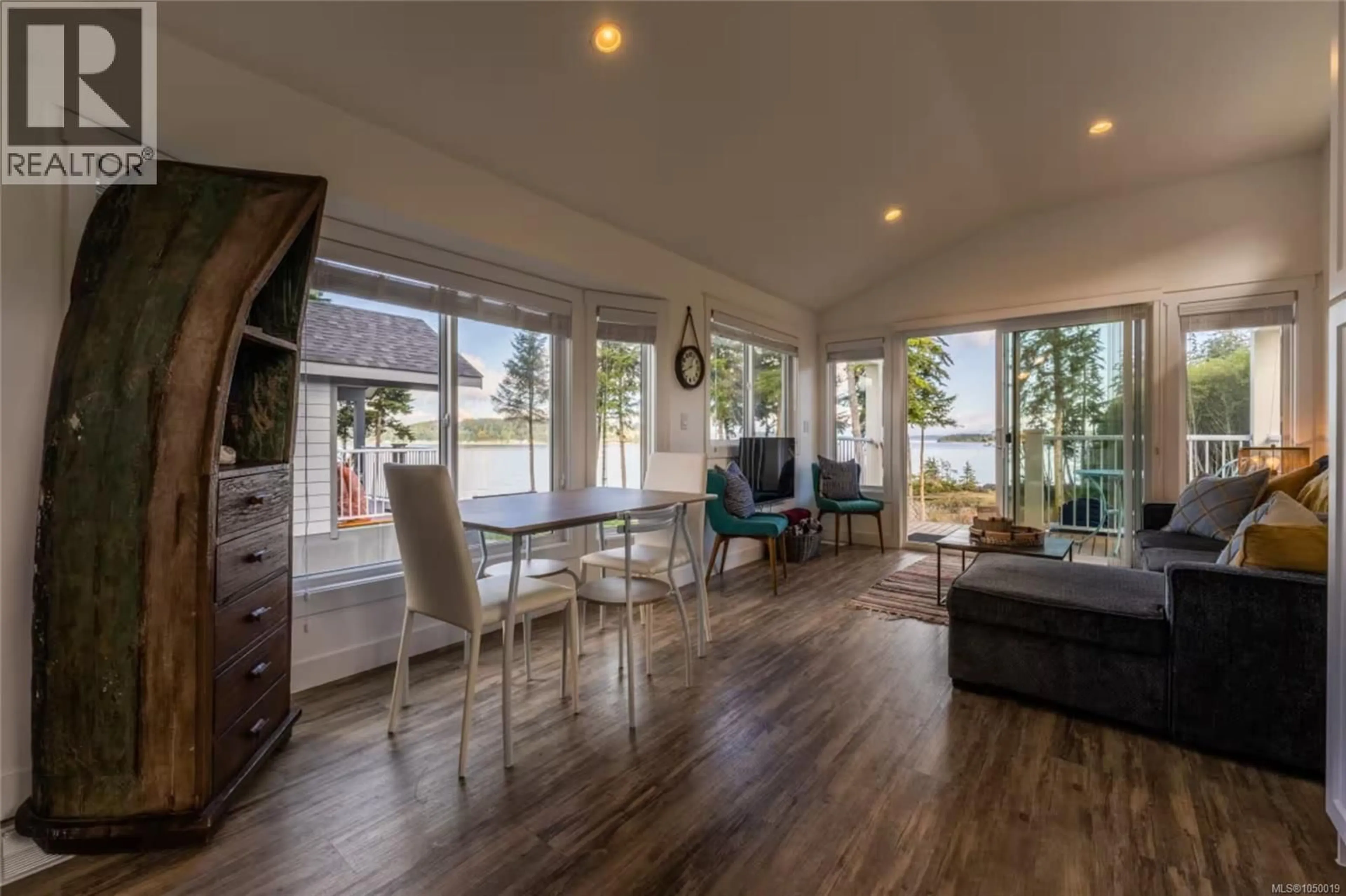 Living room with furniture, wood/laminate floor for 13 - 1 ALDER BAY ROAD, Port McNeill British Columbia V0N2R0