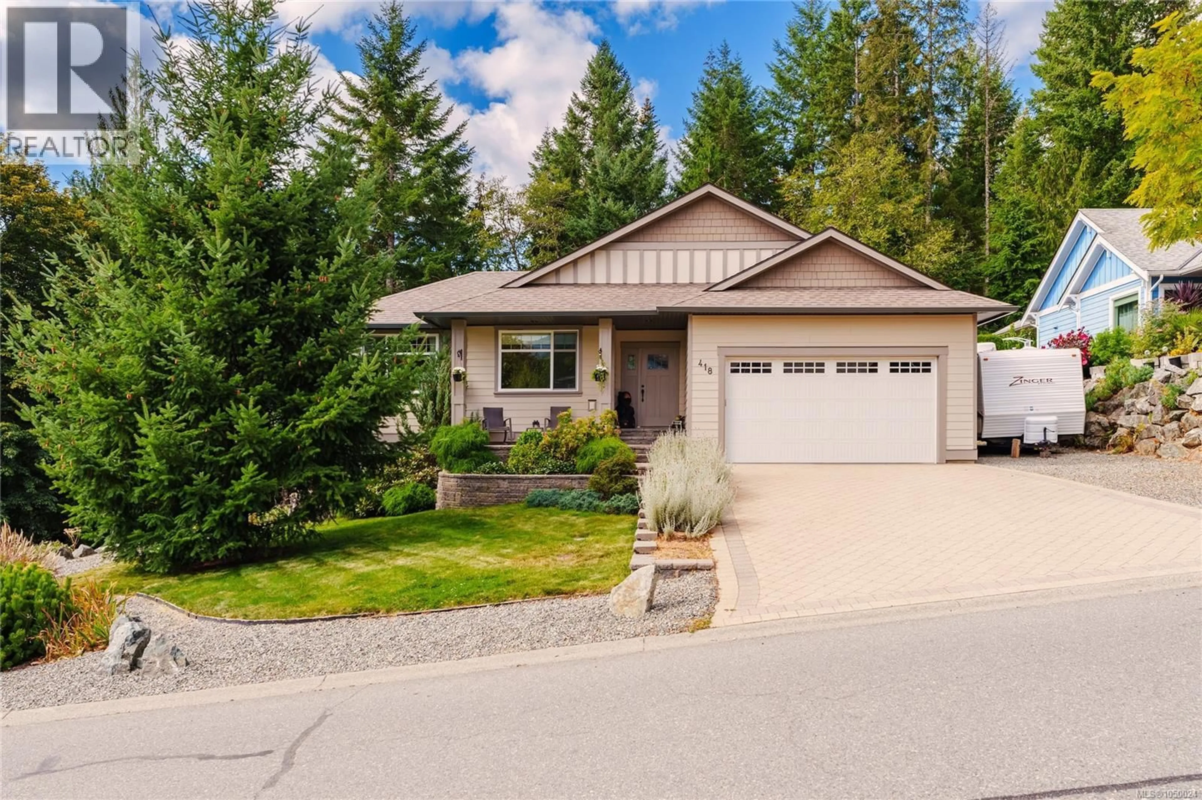 Home with vinyl exterior material, street for 418 WINTER DRIVE, Lake Cowichan British Columbia V0R2G1
