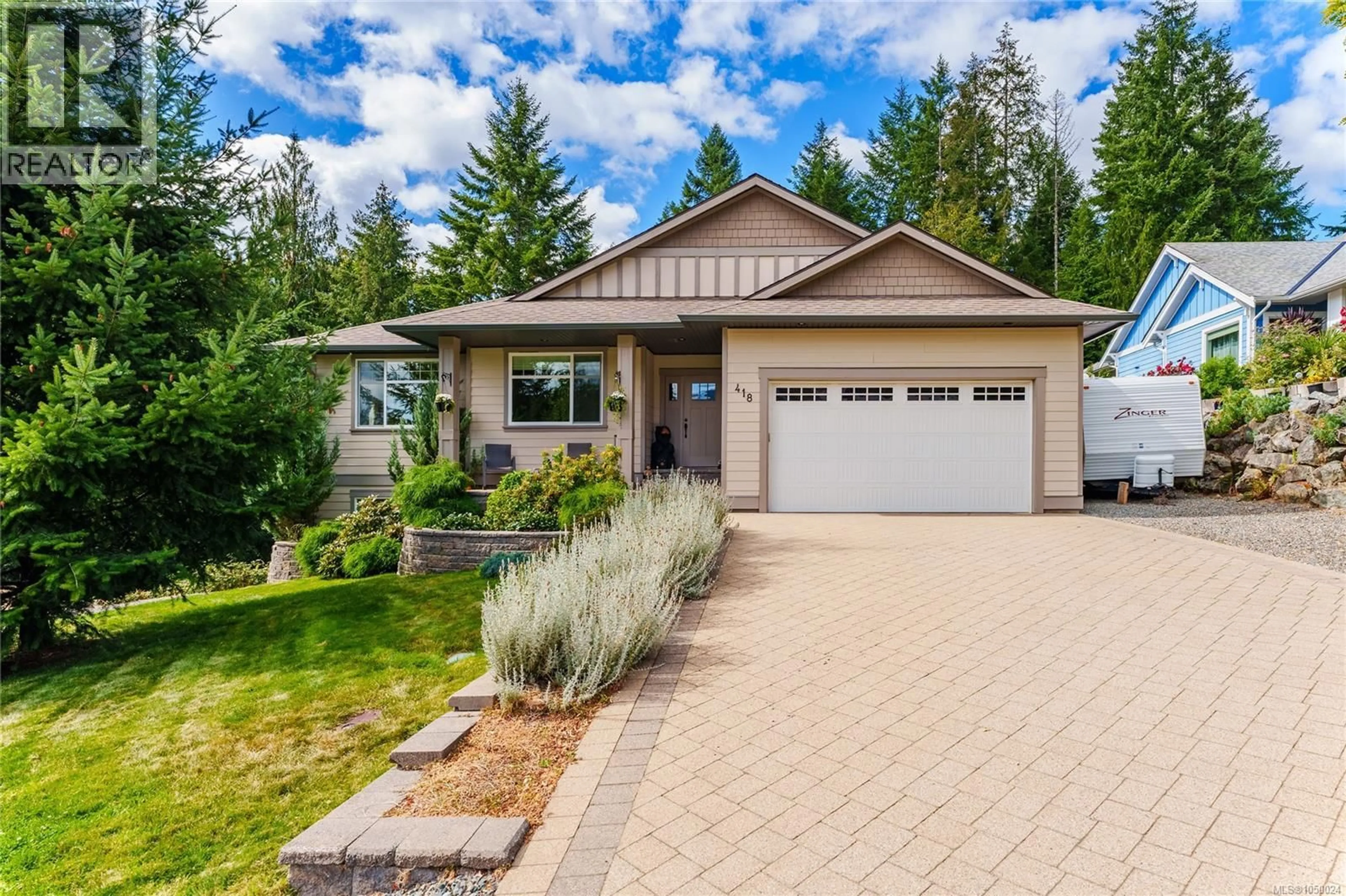 Home with vinyl exterior material, street for 418 WINTER DRIVE, Lake Cowichan British Columbia V0R2G1