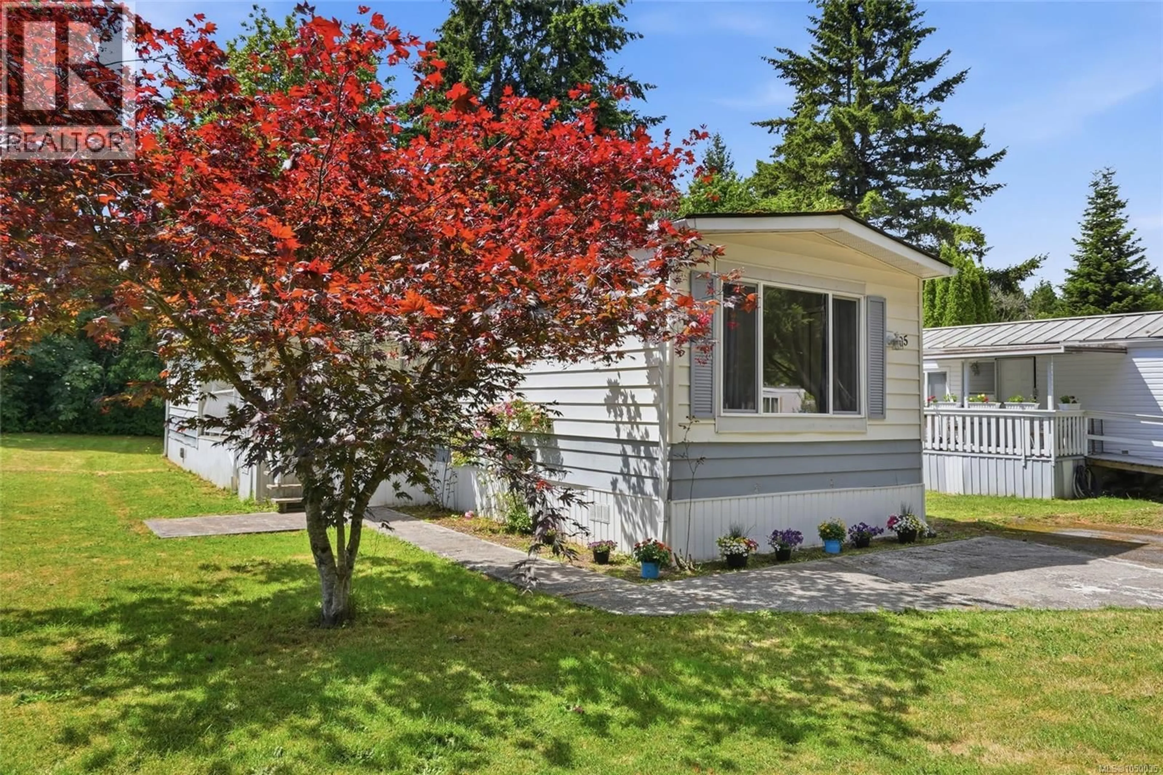 Home with vinyl exterior material, street for 105 - 1359 CRANBERRY AVENUE, Nanaimo British Columbia V9R6L5