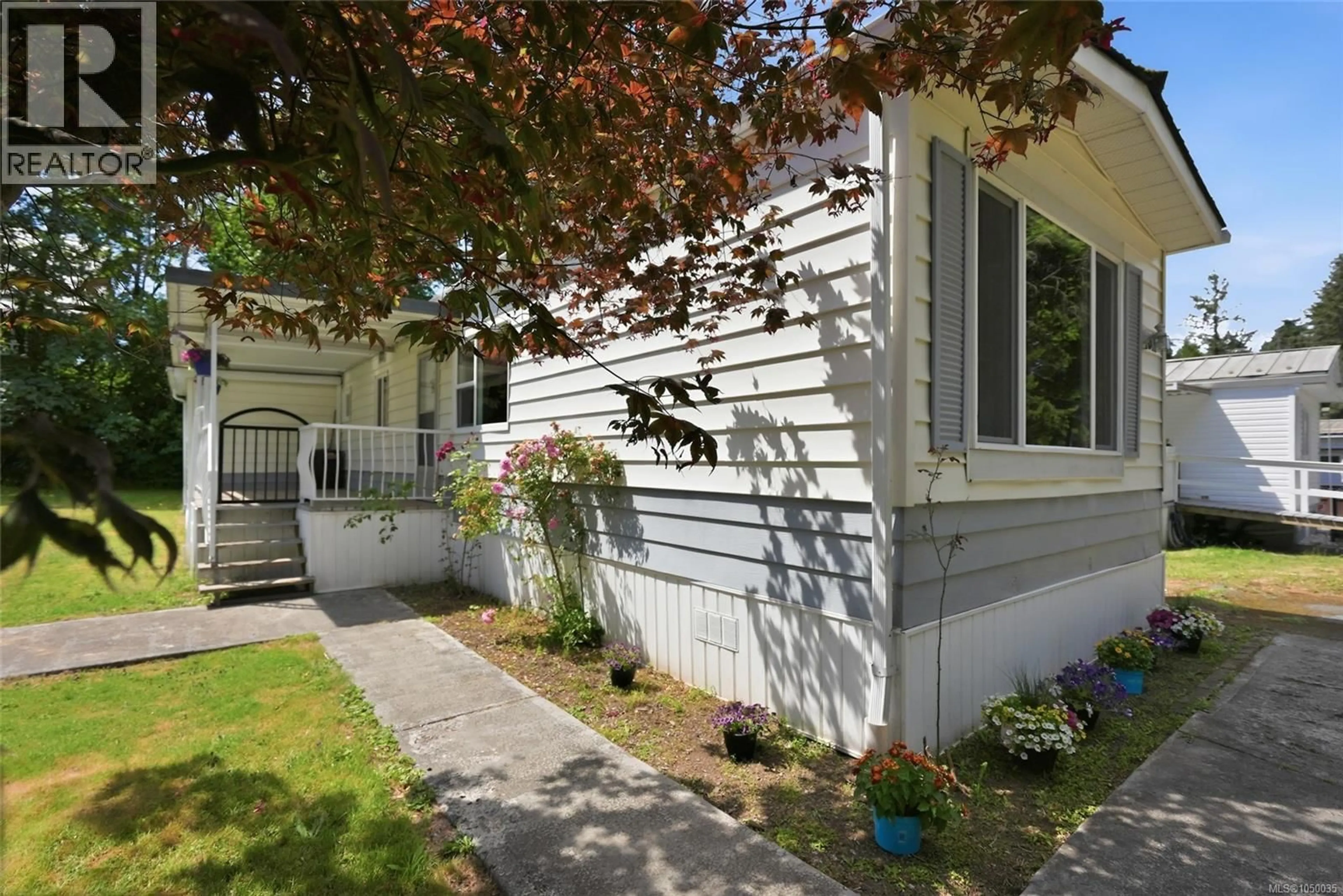 Home with vinyl exterior material, street for 105 - 1359 CRANBERRY AVENUE, Nanaimo British Columbia V9R6L5