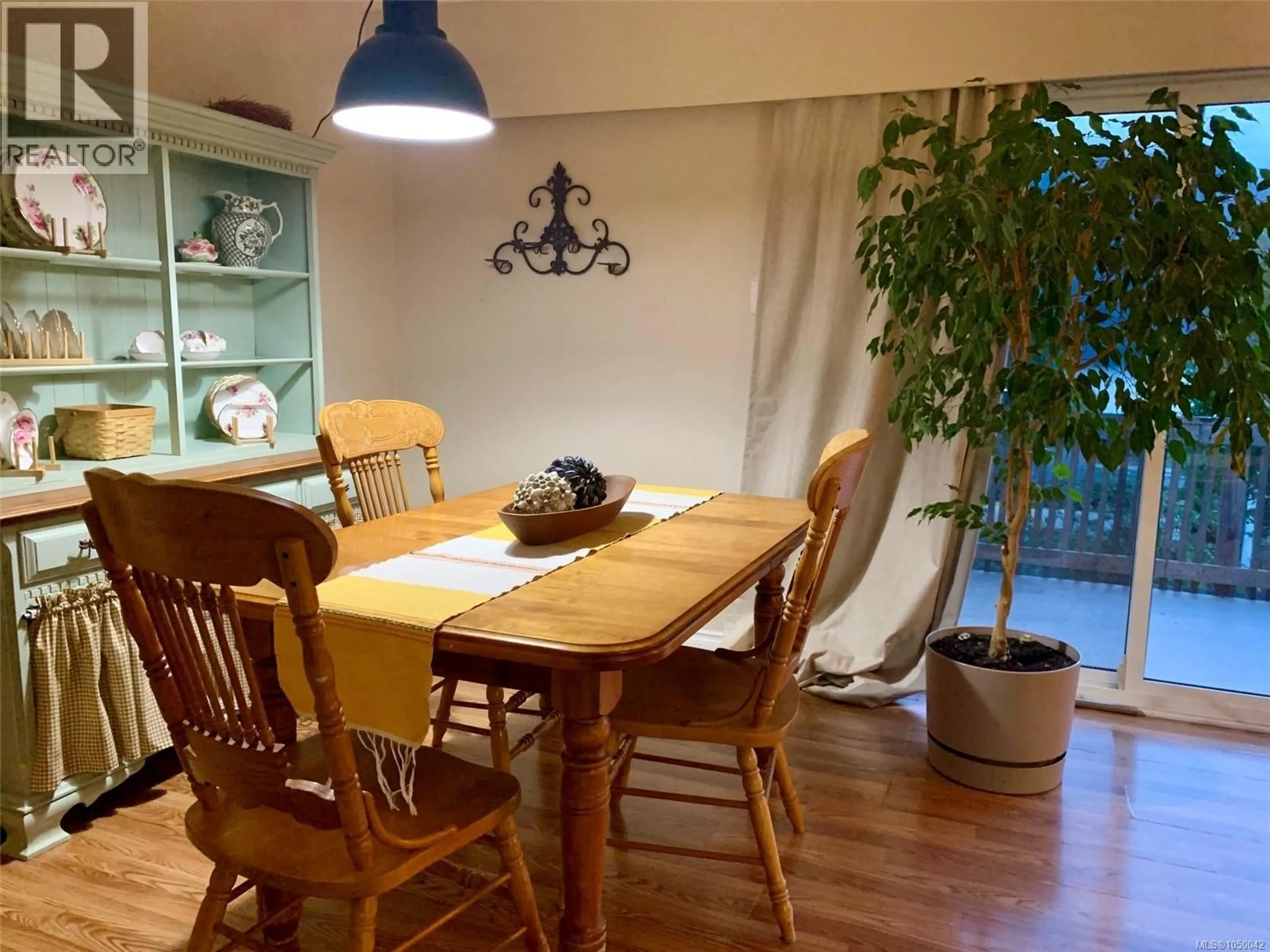 Dining room, wood/laminate floor for 9 DOGWOOD LANE, Port Alice British Columbia V0N2N0