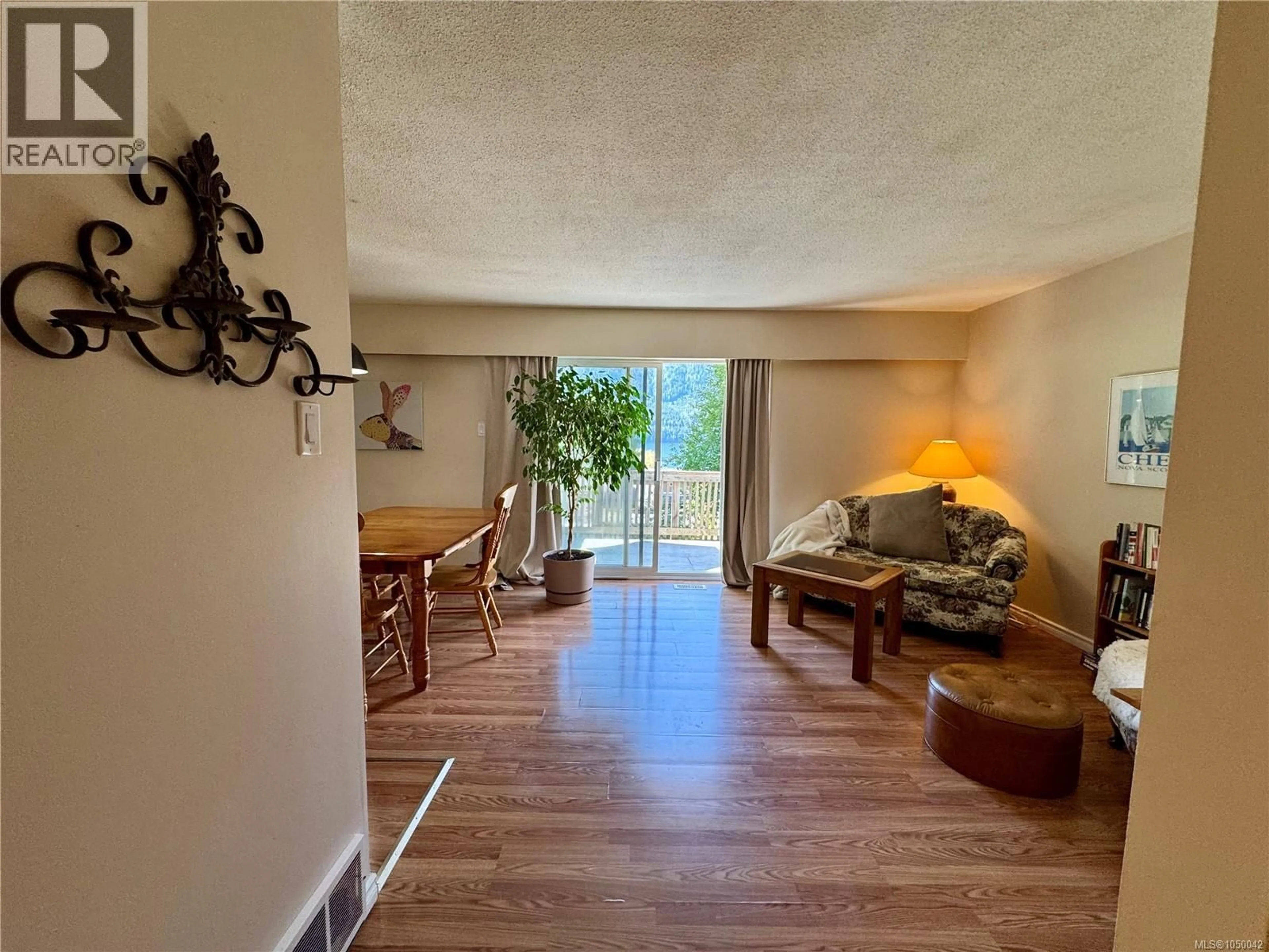 Living room with furniture, unknown for 9 DOGWOOD LANE, Port Alice British Columbia V0N2N0