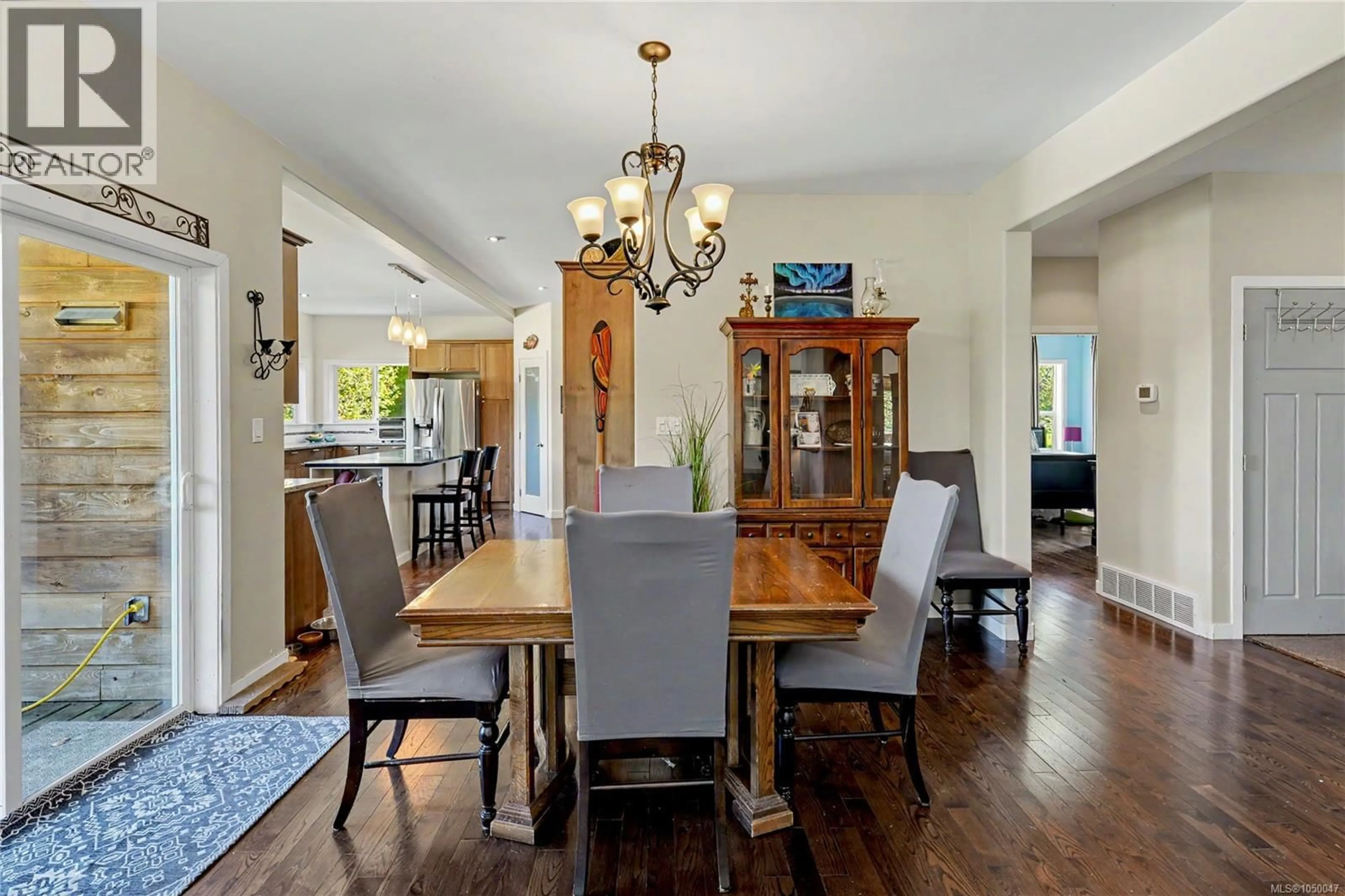 Dining room, wood/laminate floor for 2835 OLYMPIC ROAD, Qualicum Beach British Columbia V9K2L8