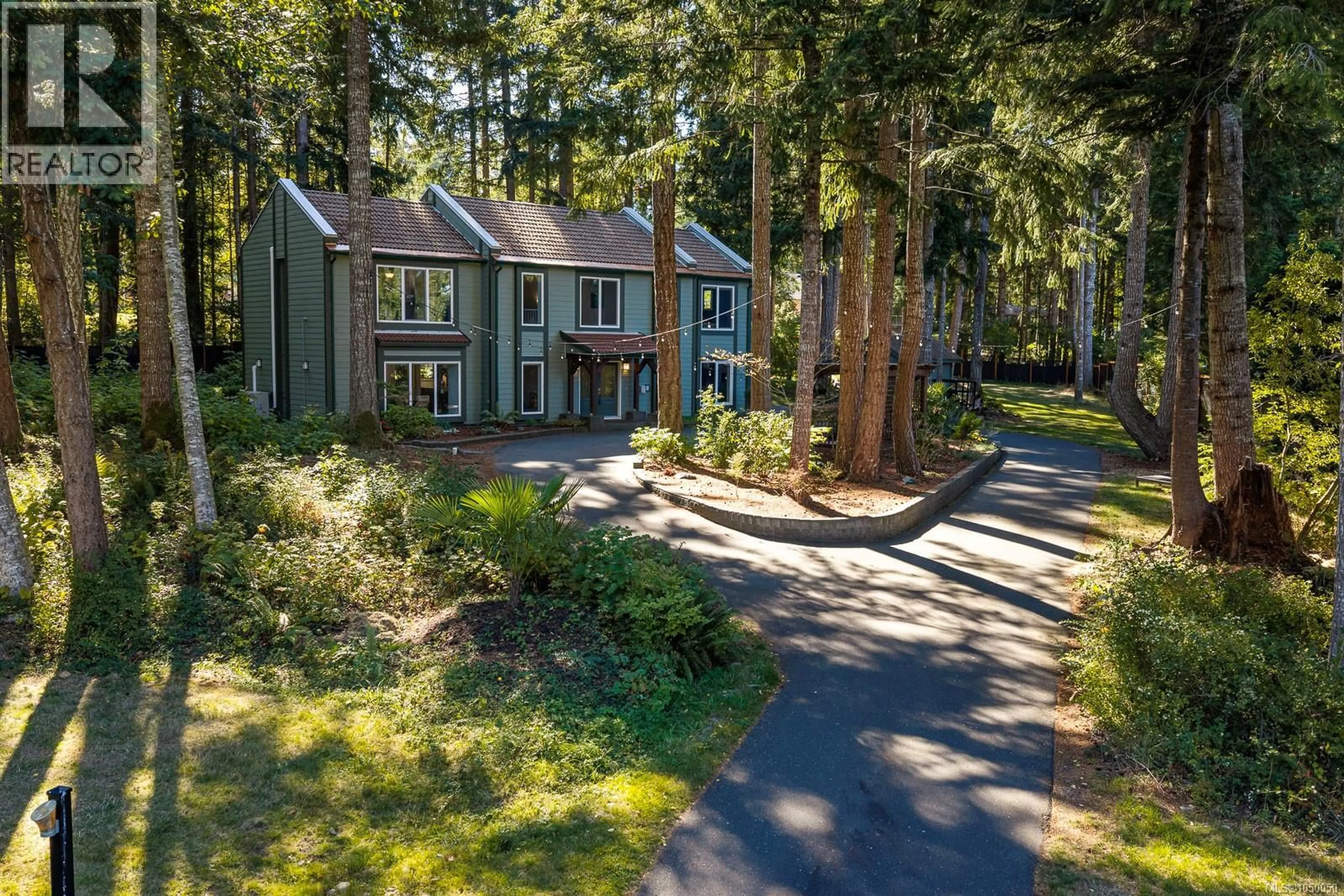 A pic from outside/outdoor area/front of a property/back of a property/a pic from drone, forest/trees view for 2219 SEA LION WAY, Courtenay British Columbia V9J1Y2