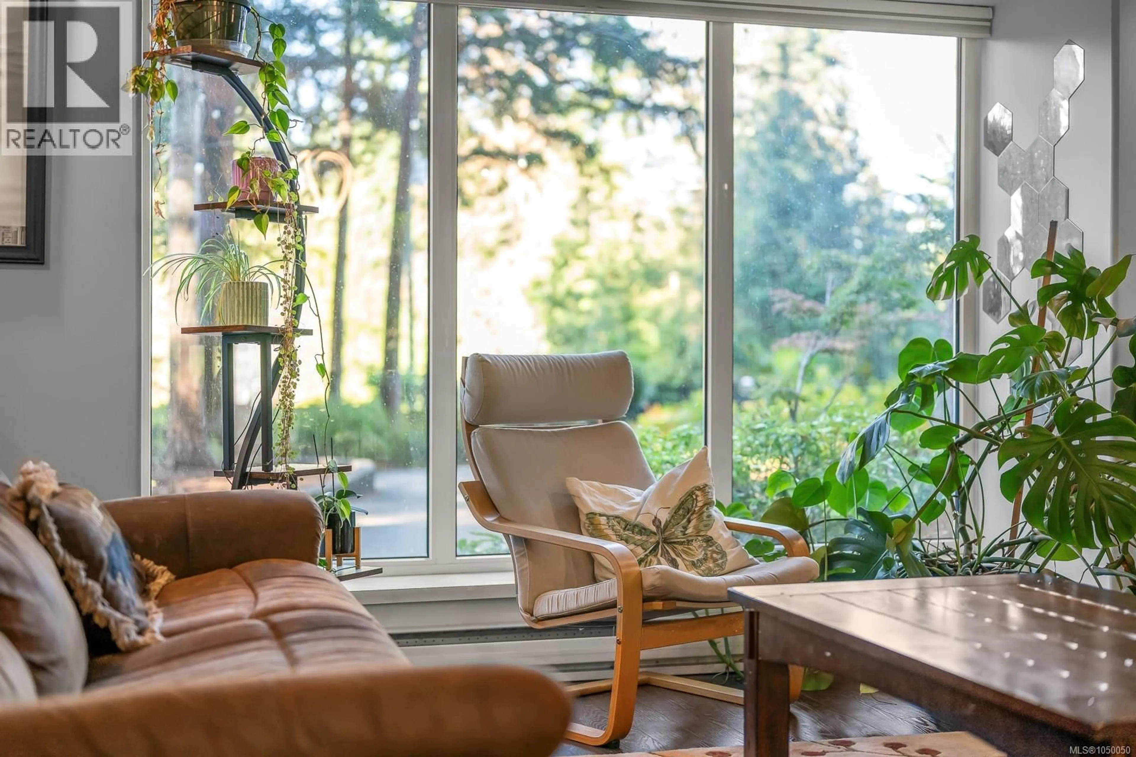 Living room with furniture, wood/laminate floor for 2219 SEA LION WAY, Courtenay British Columbia V9J1Y2