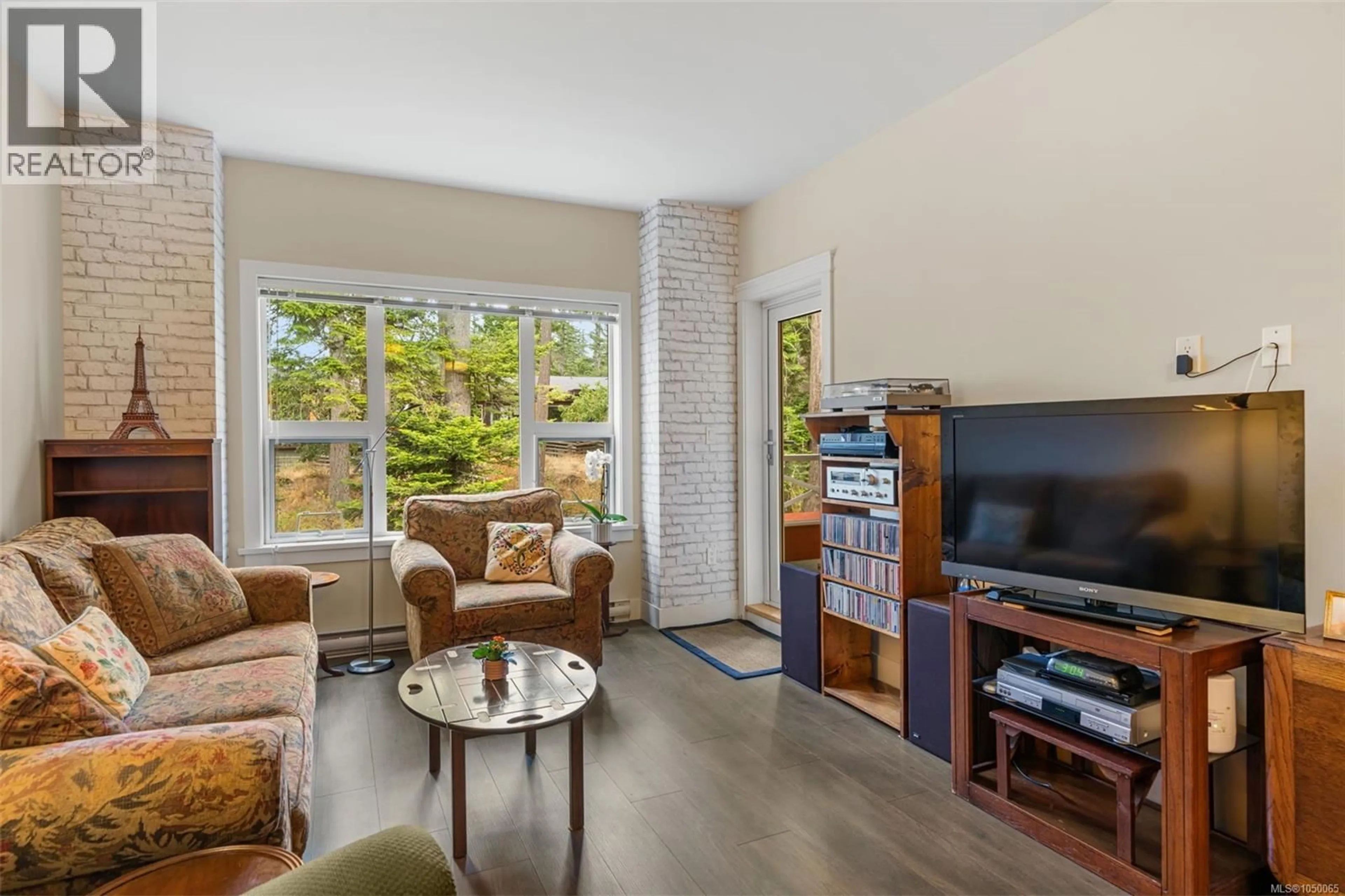 Living room with furniture, unknown for 306 - 1900 WATKISS WAY, View Royal British Columbia V9B0S8
